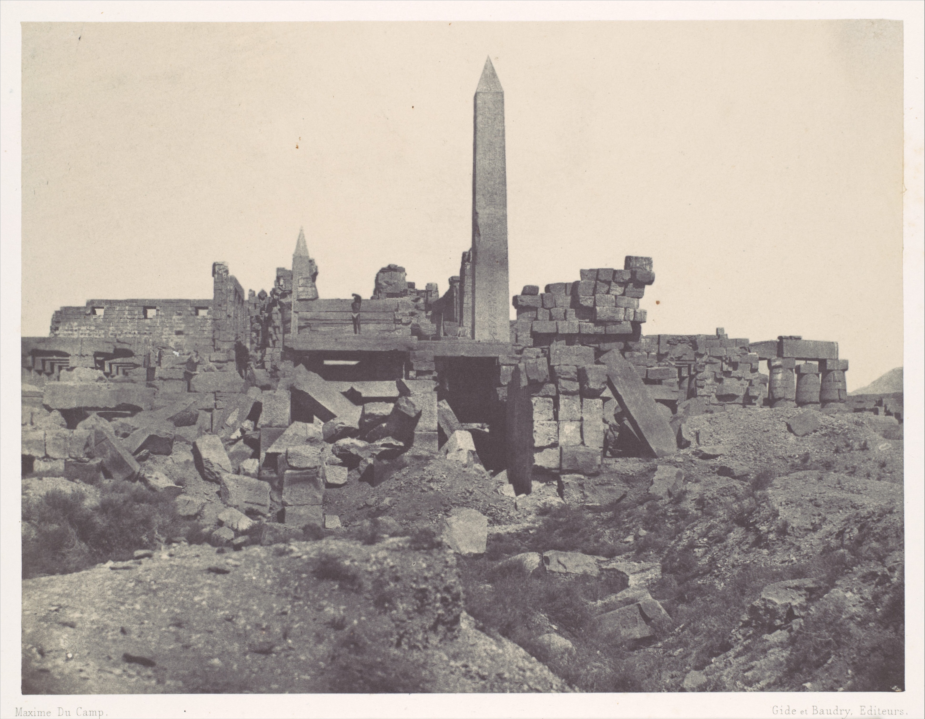 Ancient Egyptian Temple Ruins with Obelisk