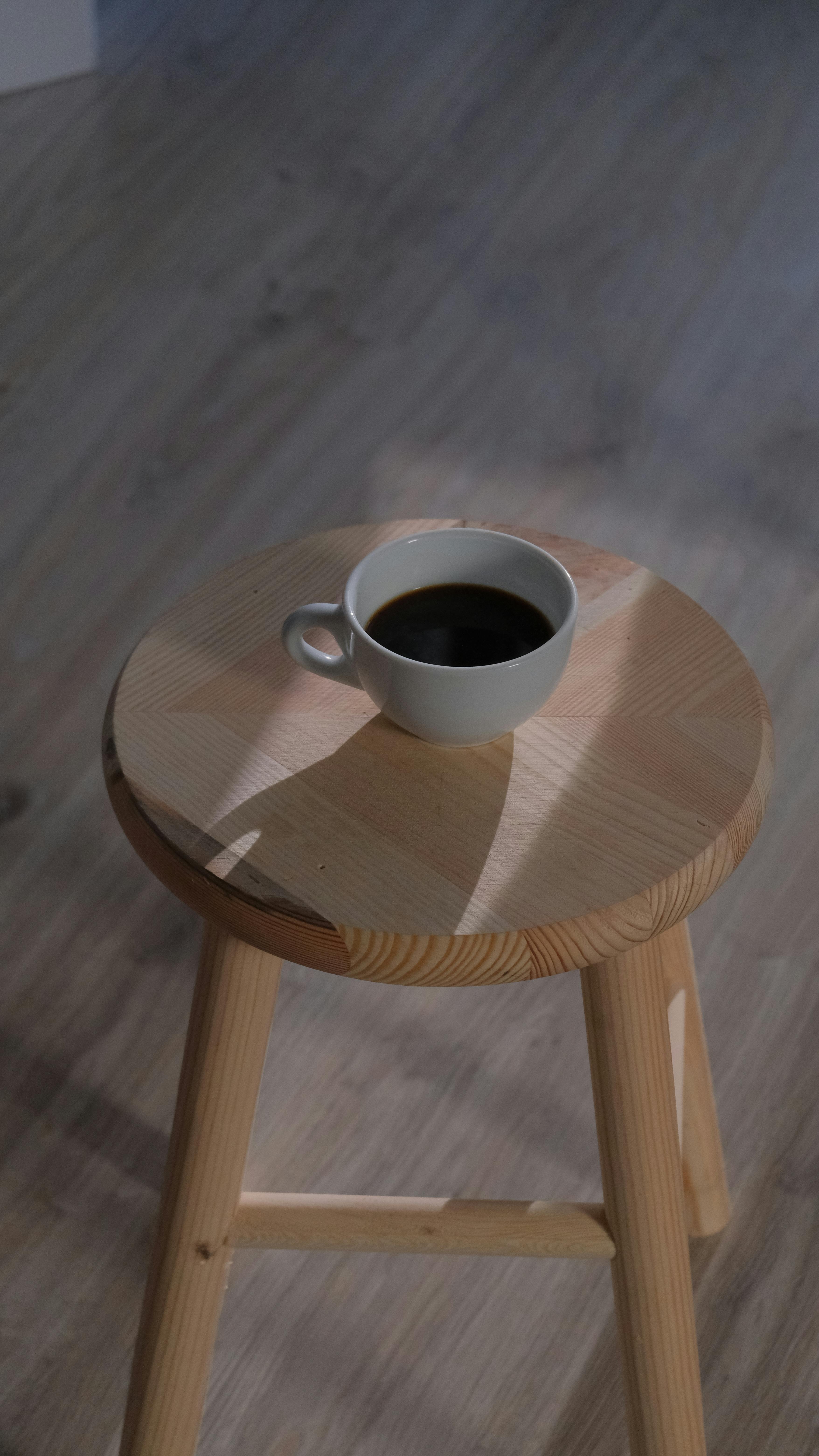 Black Coffee on Wooden Stool