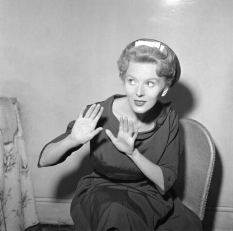 Surprised Woman Making Stop Gesture