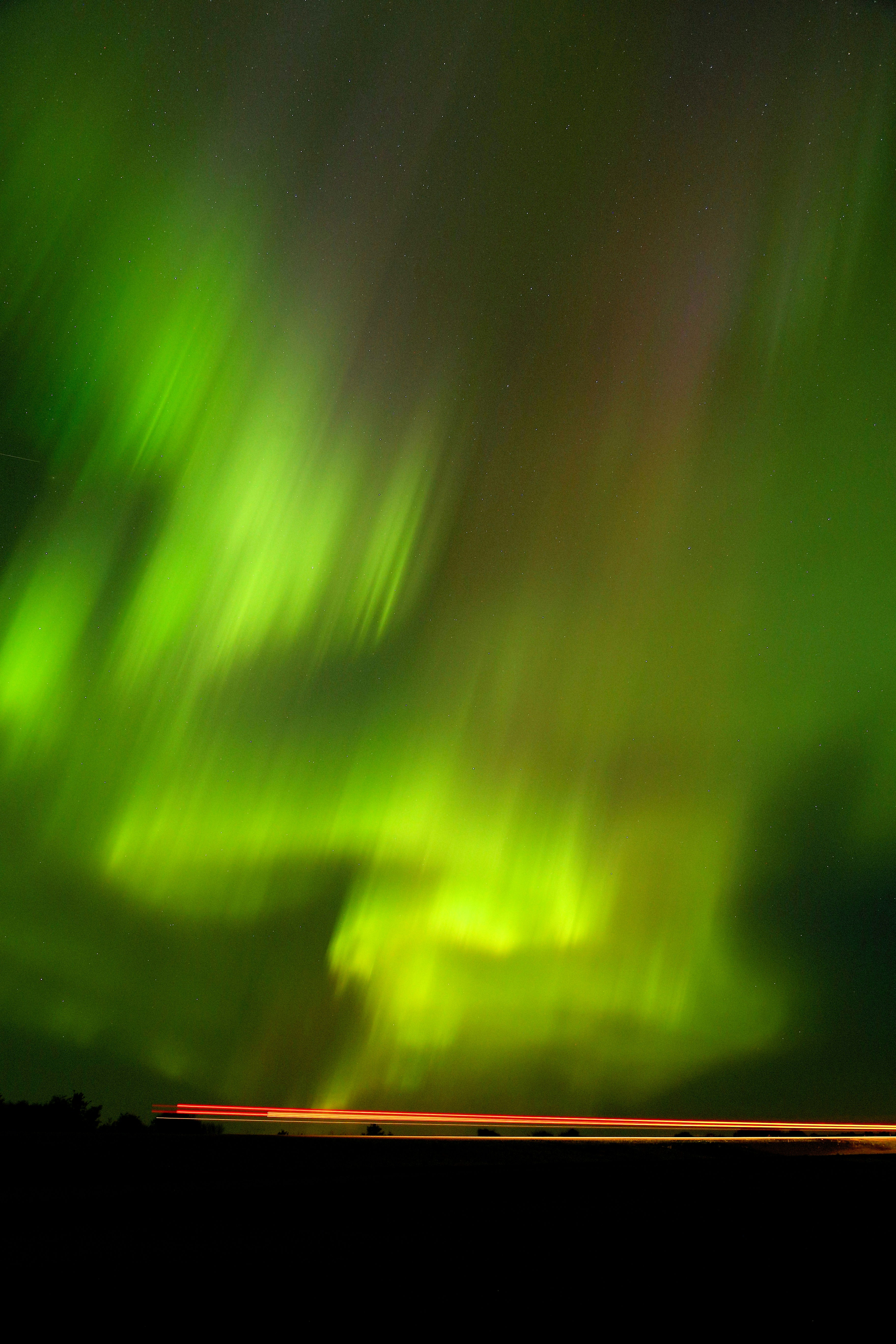 Green Northern Aurora Over Night Road