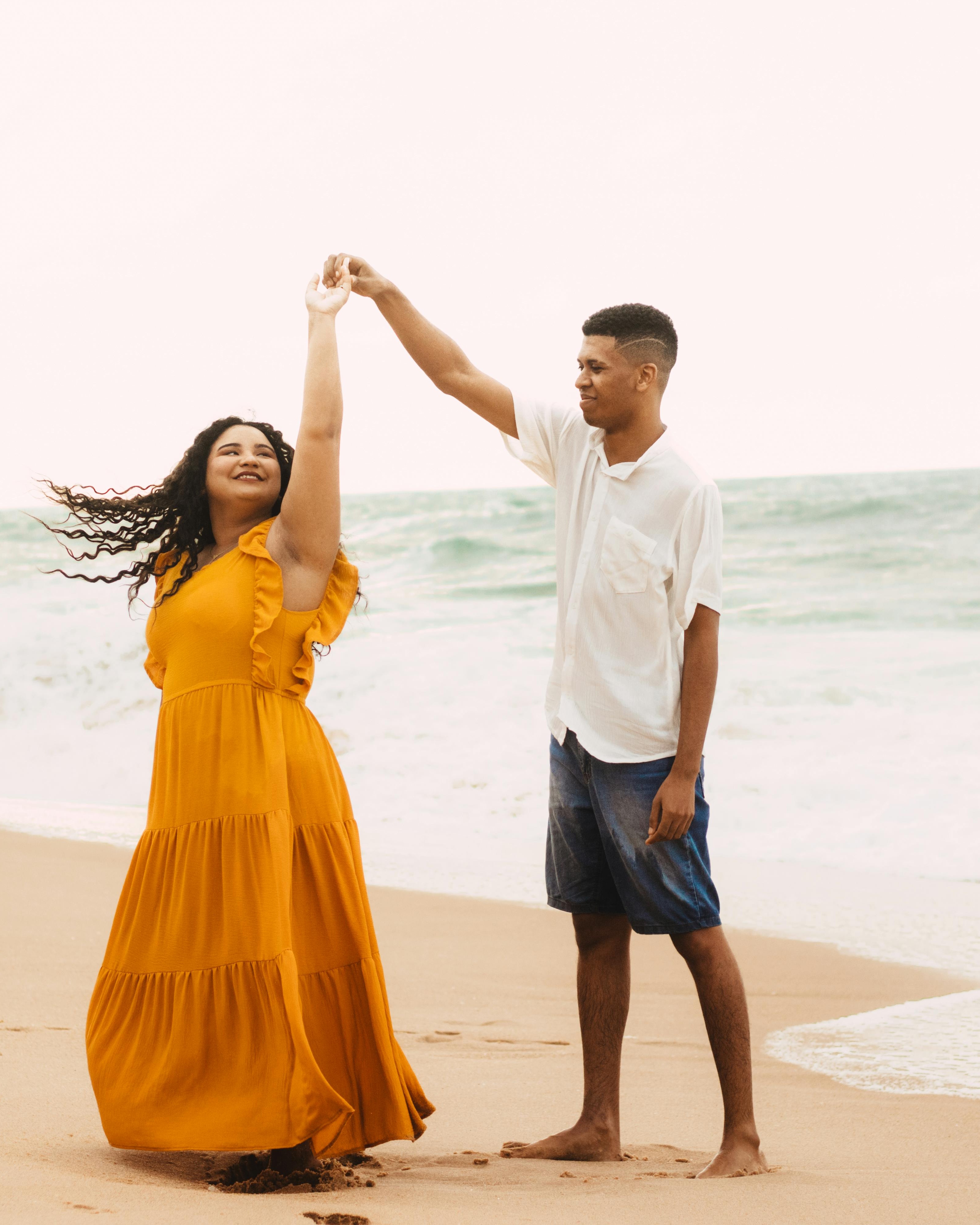 Couple Dancing on Sandy Beach