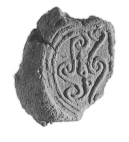 Fragment of Carved Ancient Pottery