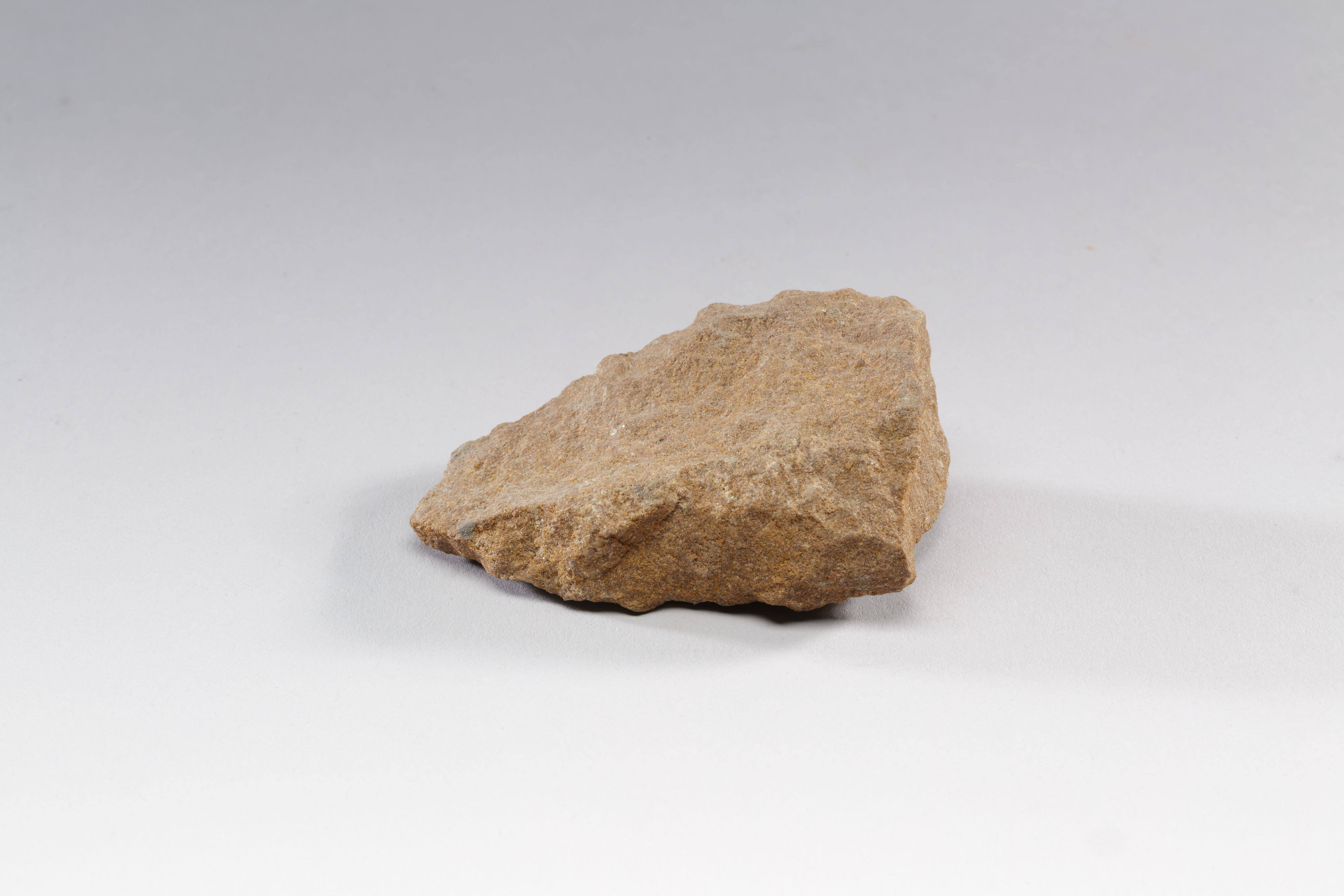 Brown Rough Rock on Neutral Background