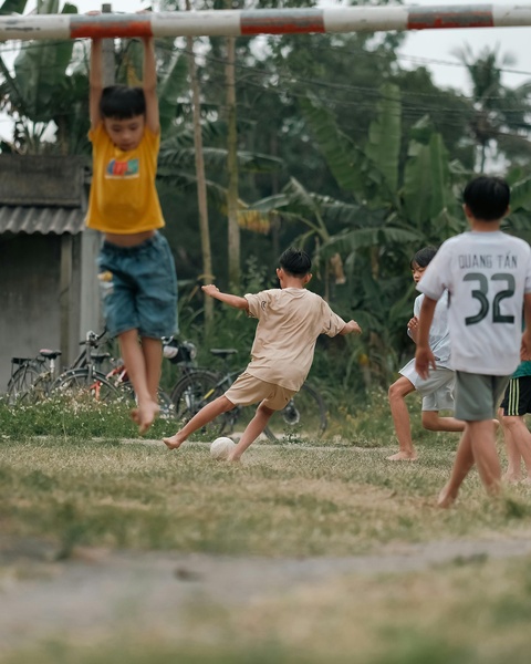 Kids Playing Soccer Outdoors