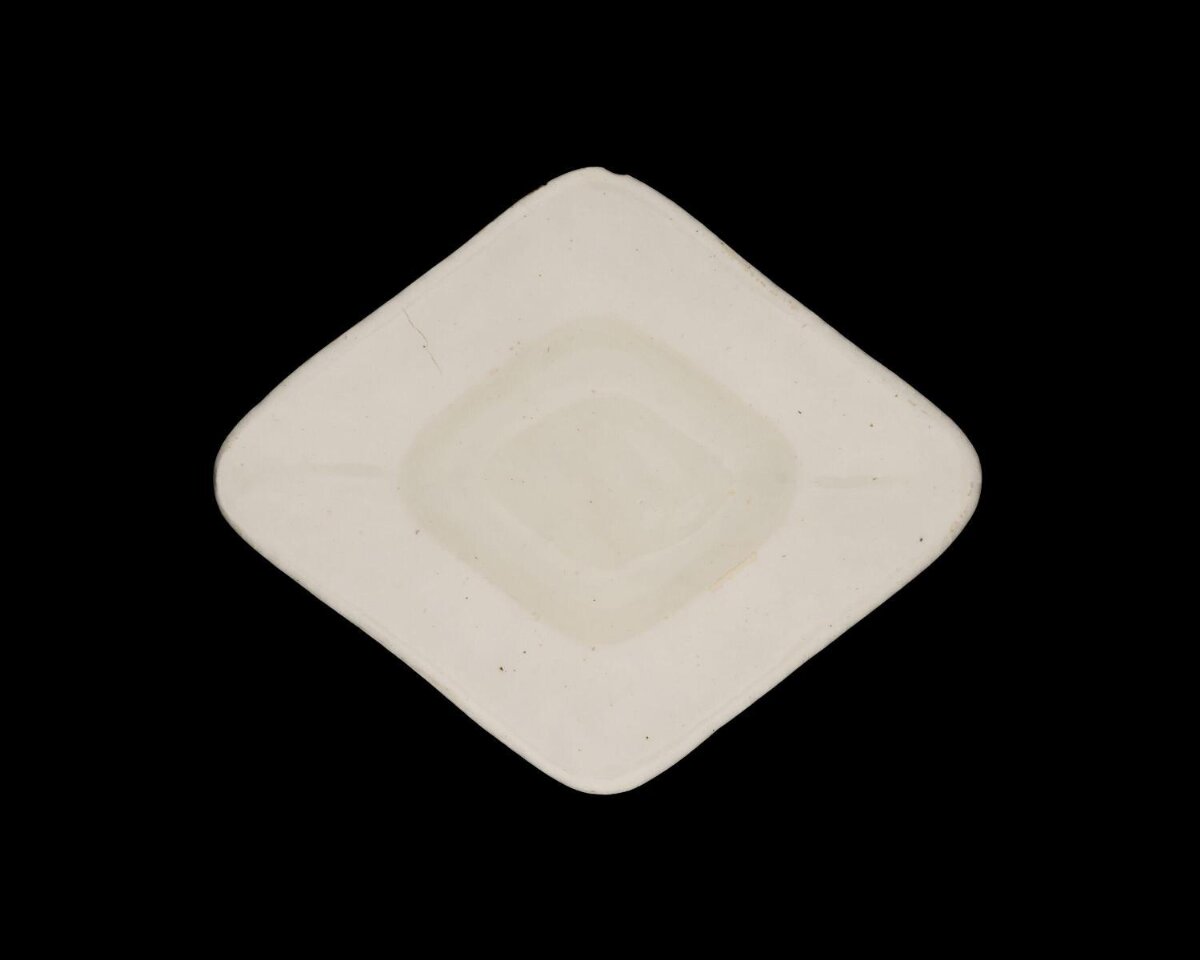 White Square Dish On Black Background