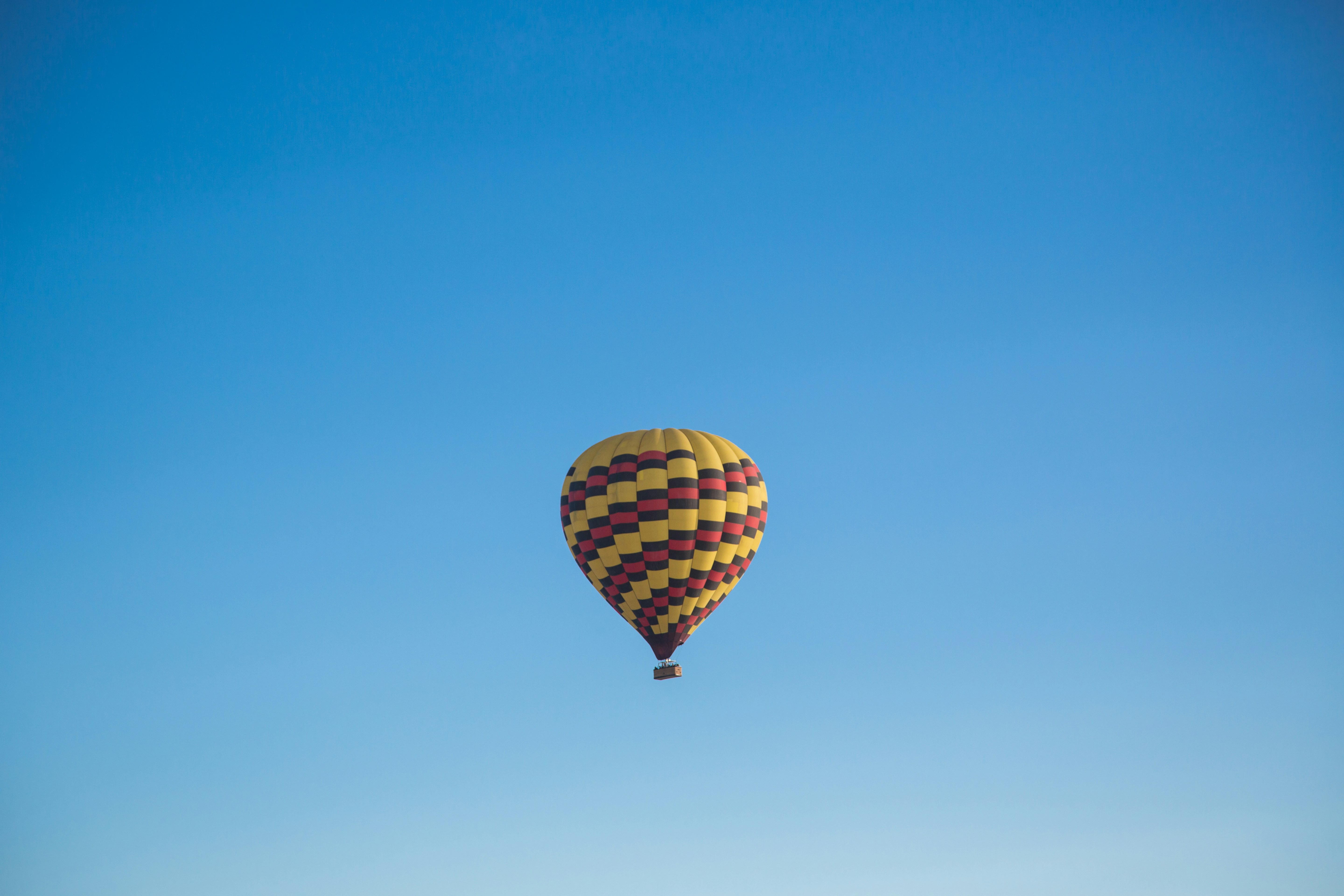 Hot Air Balloon In Clear Blue Sky