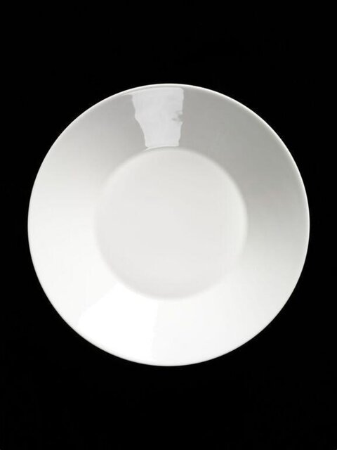 White Ceramic Plate on Black Background