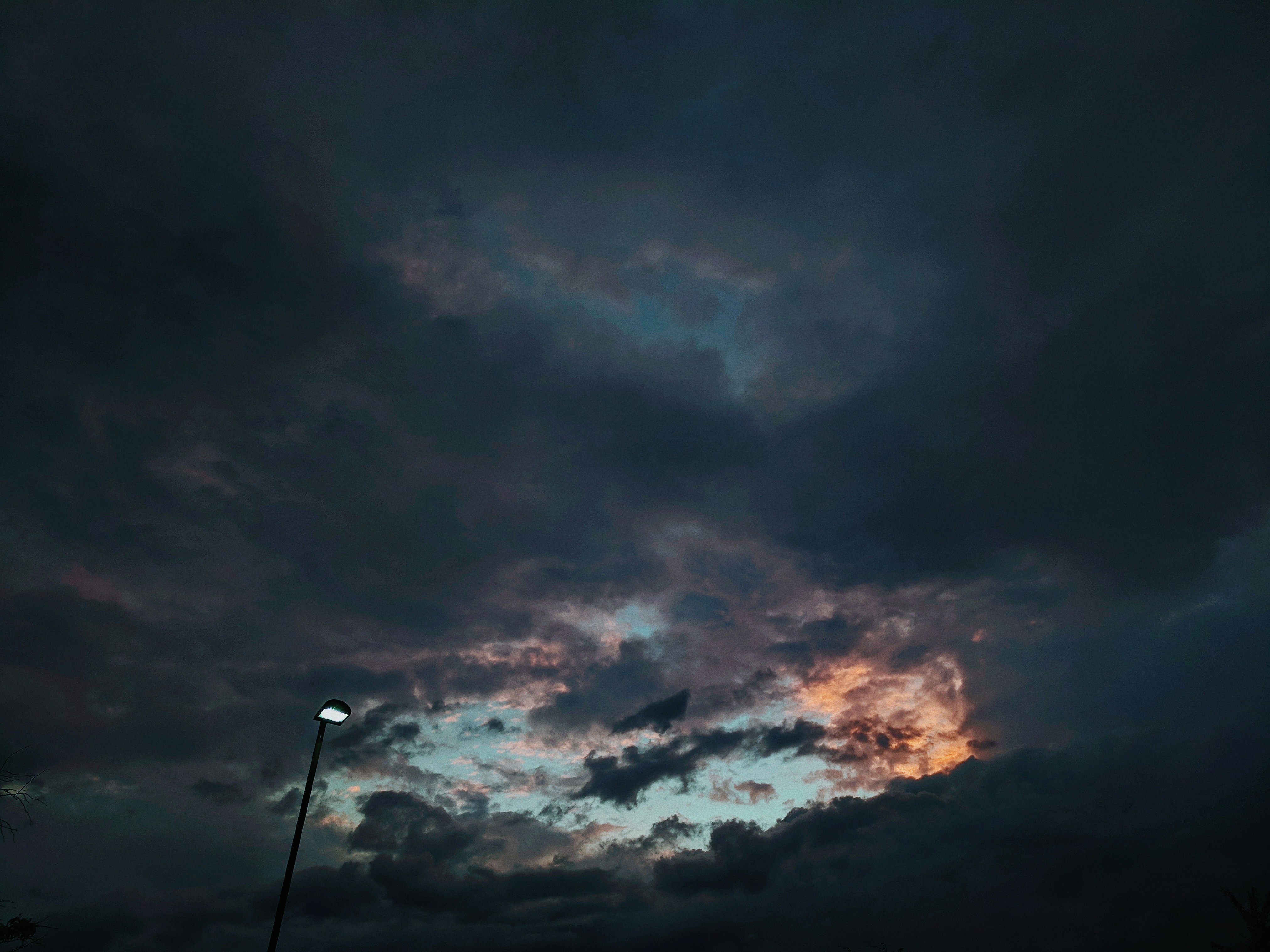 Dusk Cloudy Sky With Street Lamp