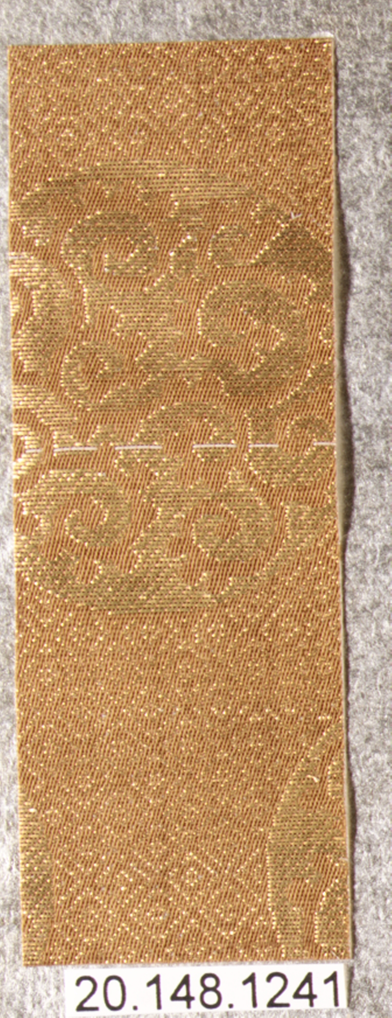 Golden Patterned Fabric Sample