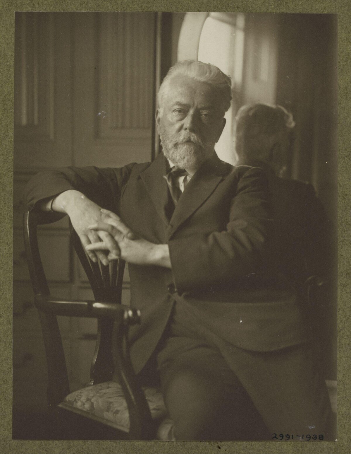 Vintage Portrait of Seated Older Gentleman