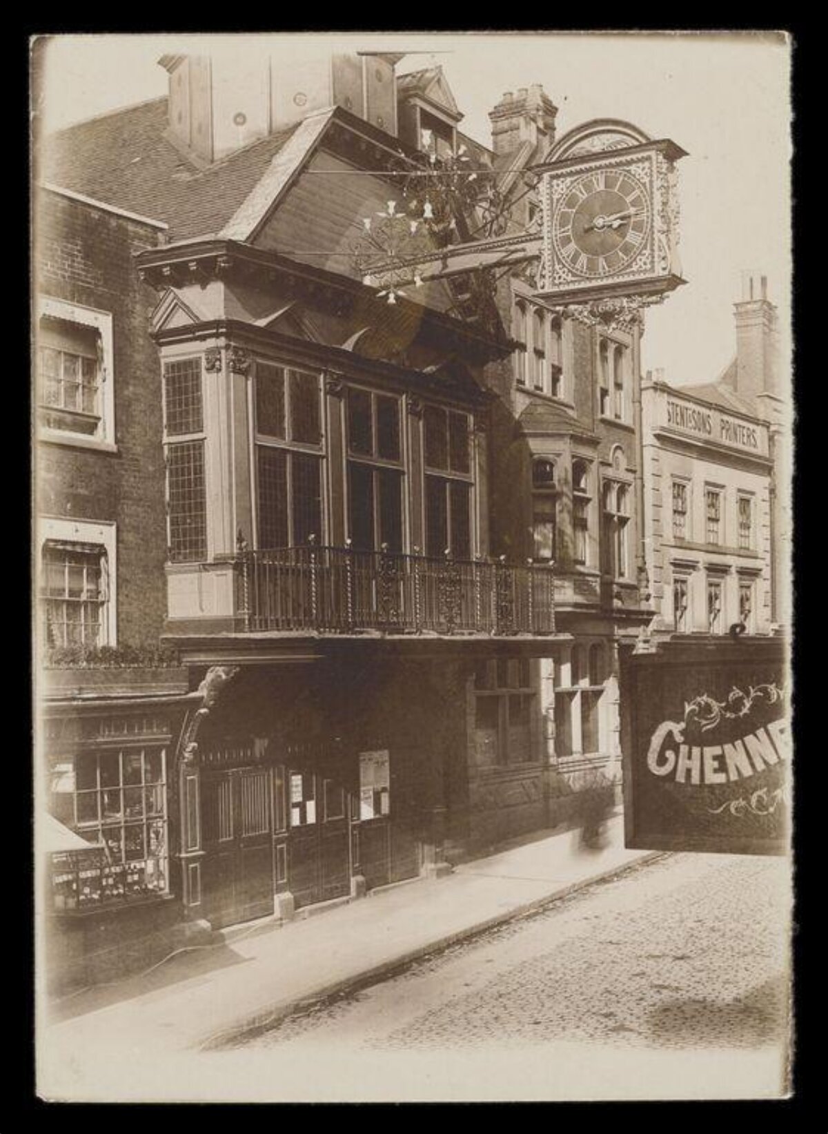 Old Street Corner with Hanging Clock