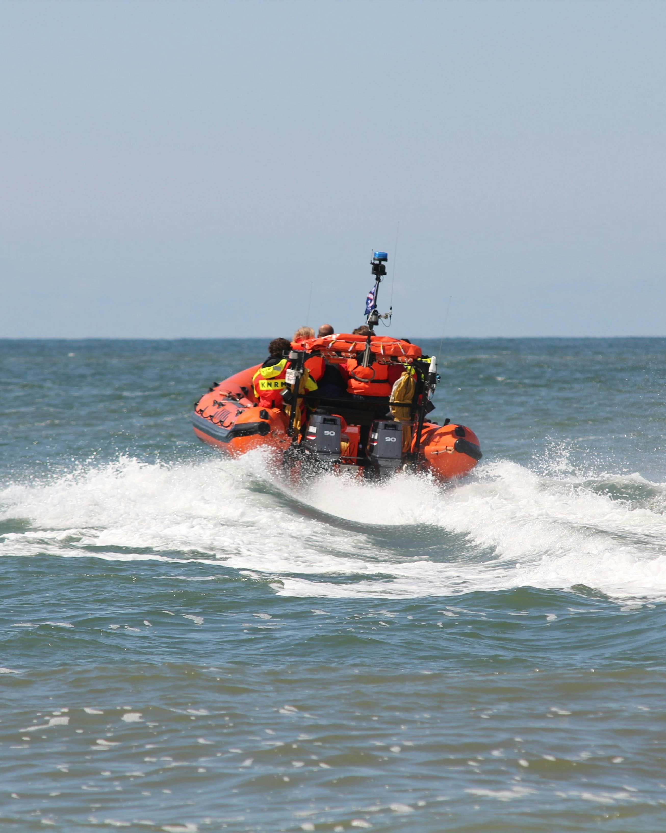 Rescue Boat Moving on Open Sea