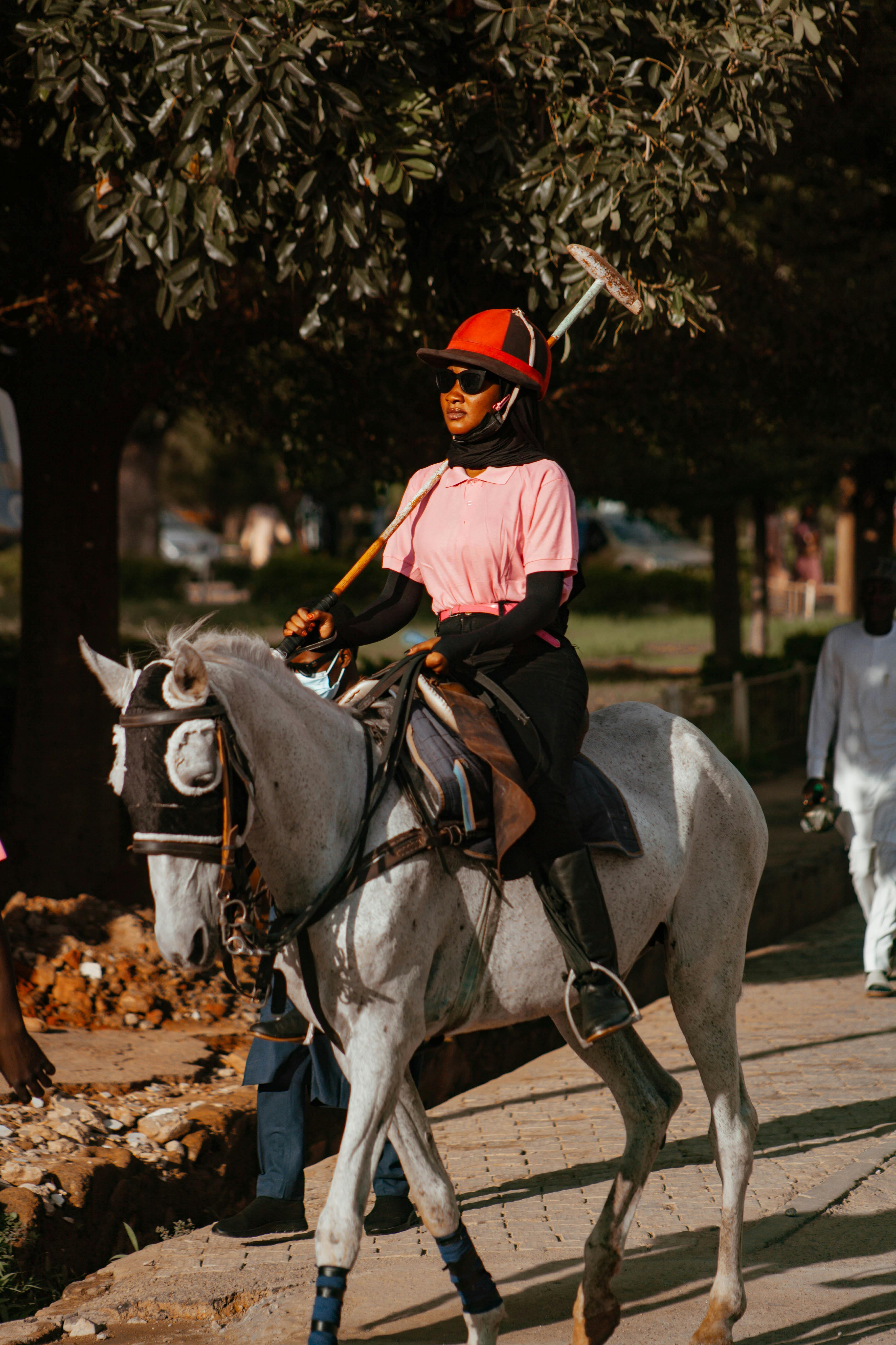 Female Polo Player on Horseback