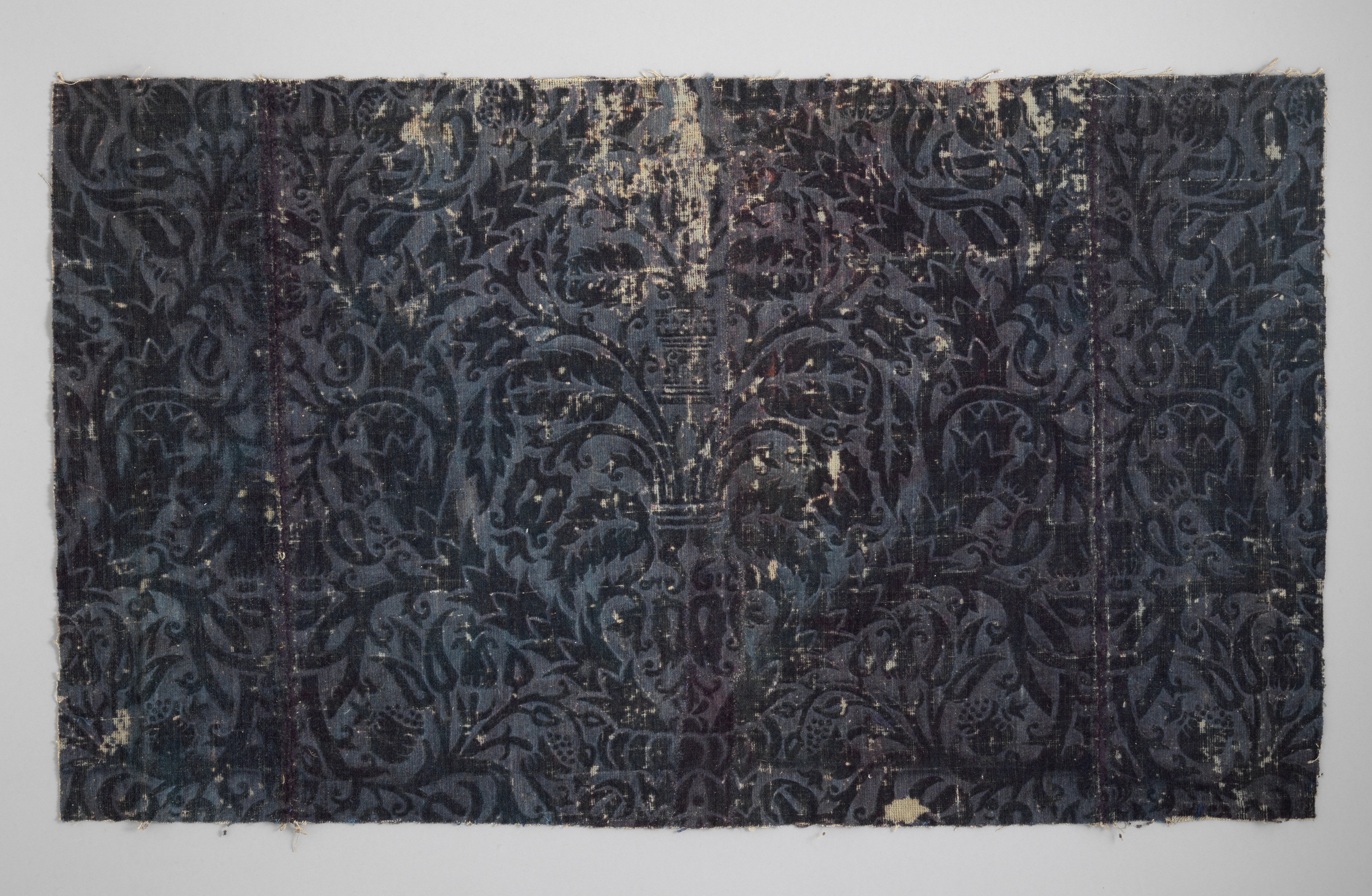 Antique Dark Patterned Textile Fragment