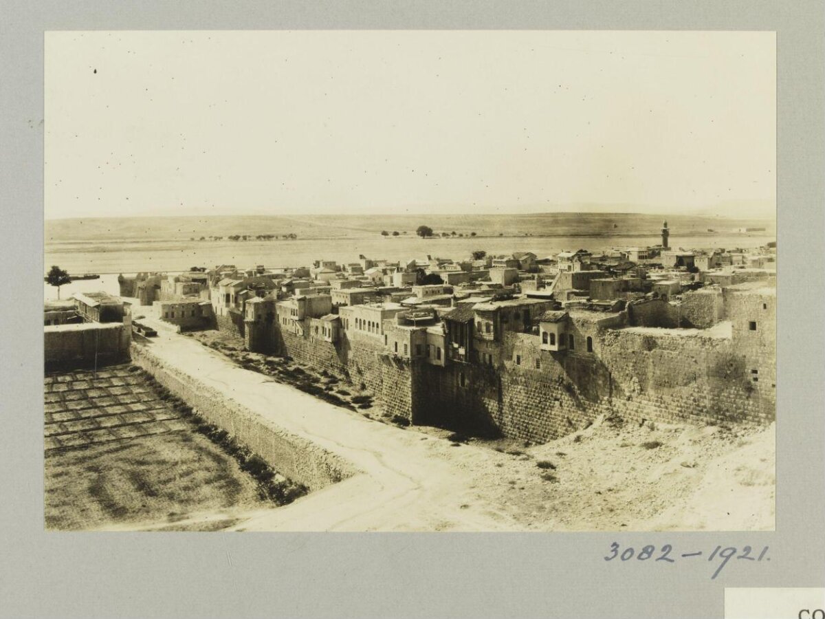 Vintage View of Walled Riverside Town