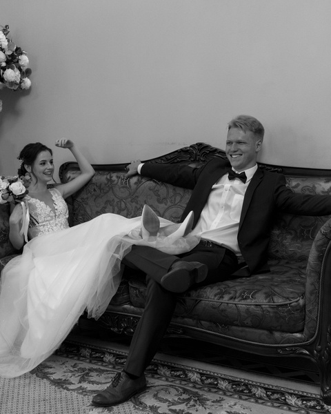 Bride and Groom Relaxing on Couch