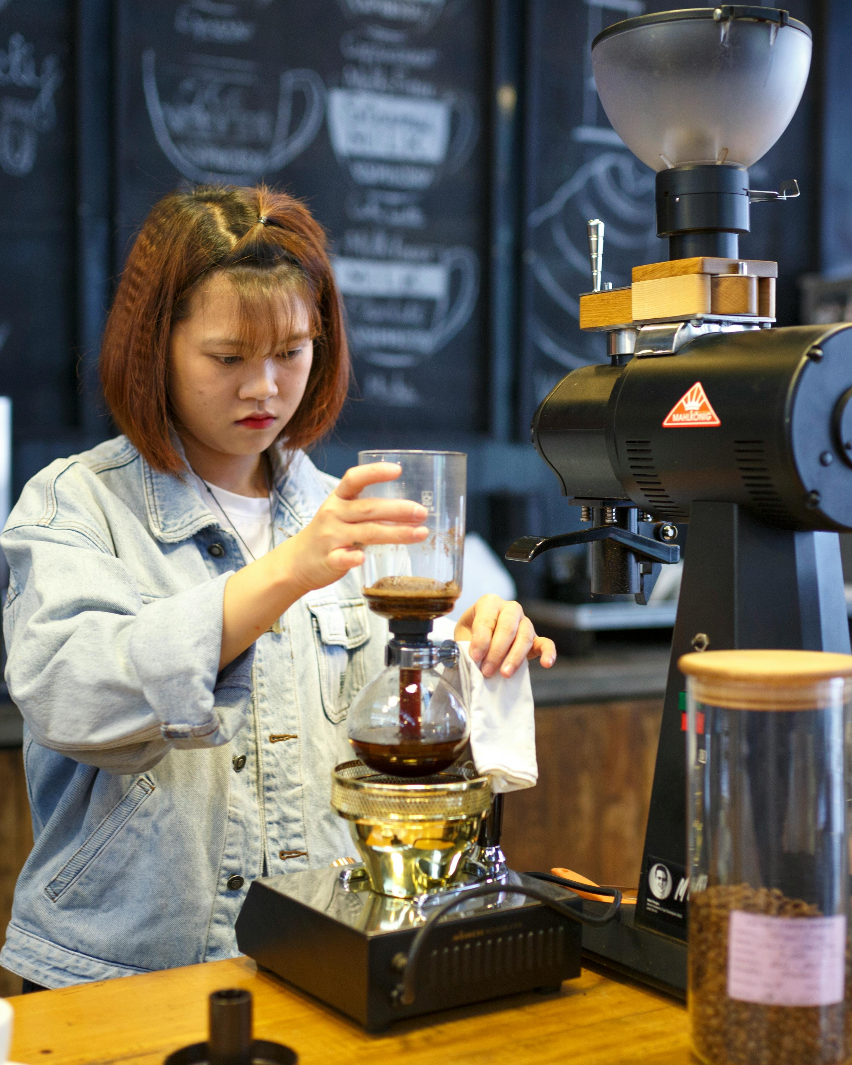 Barista Preparing Siphon Coffee