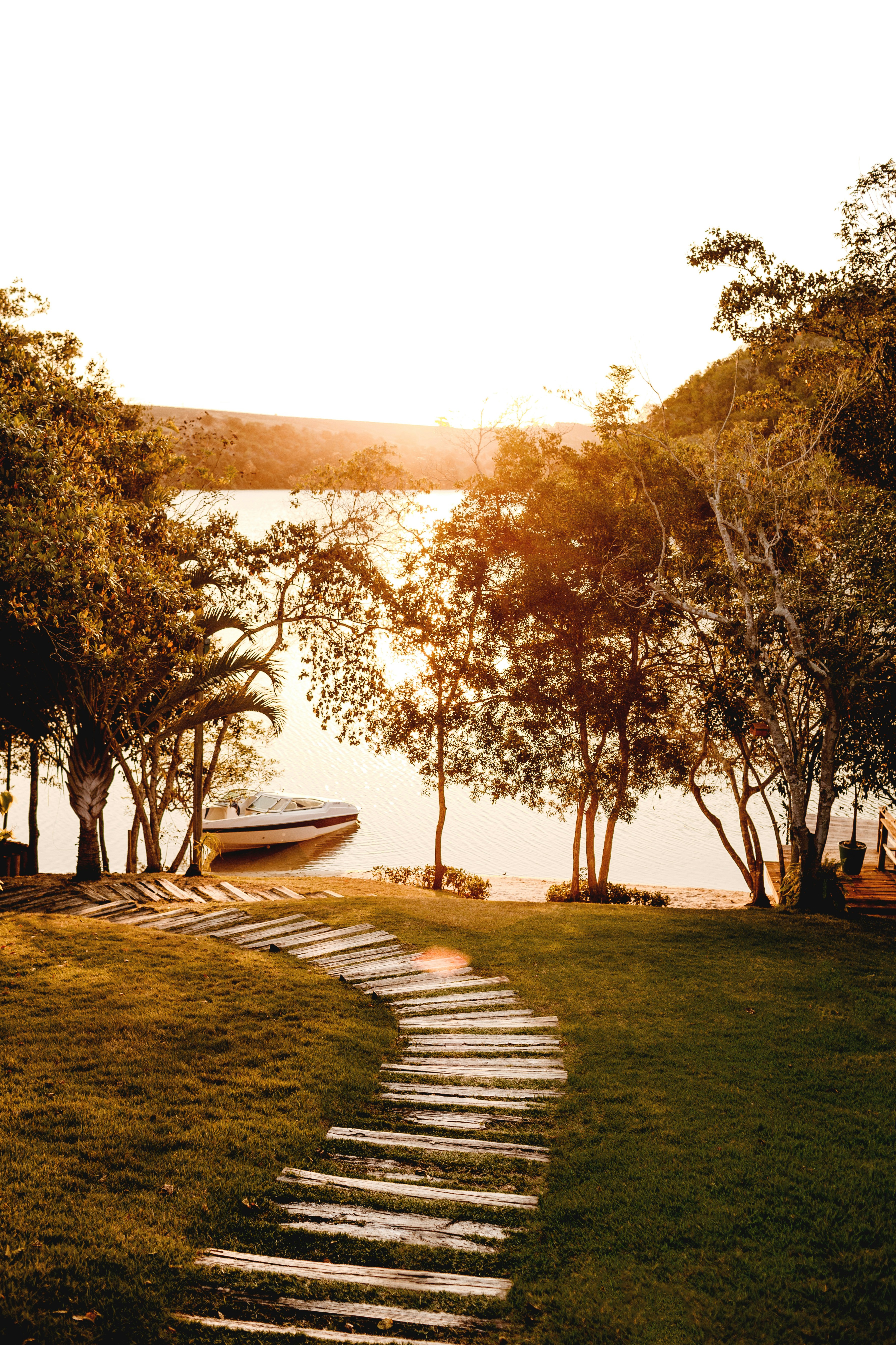 Lakeside Wooden Path at Sunset