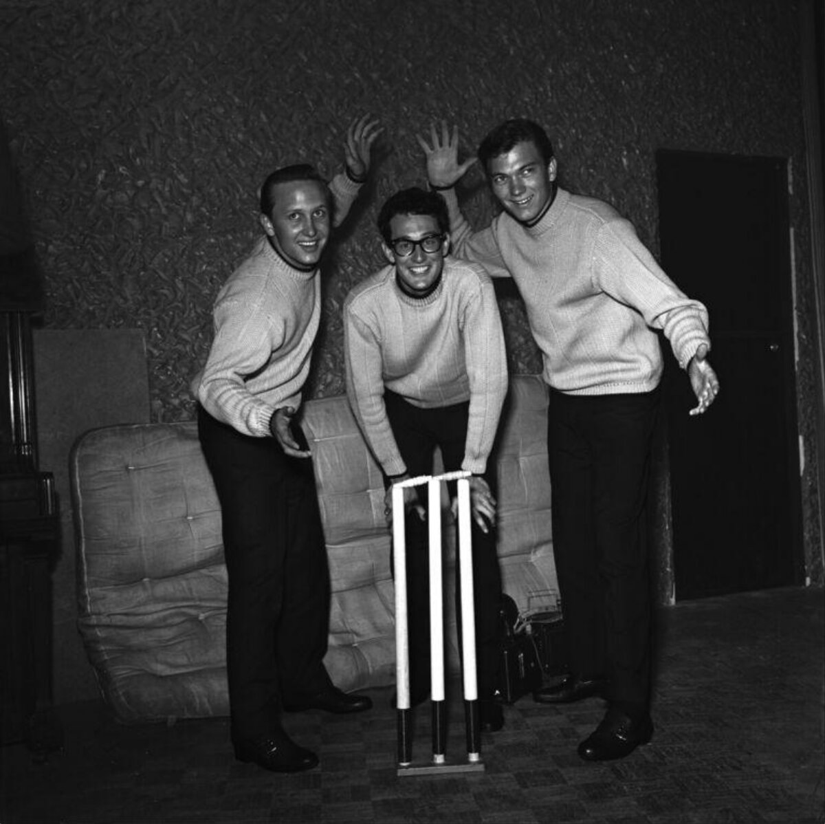 Three Men With Indoor Cricket Stumps