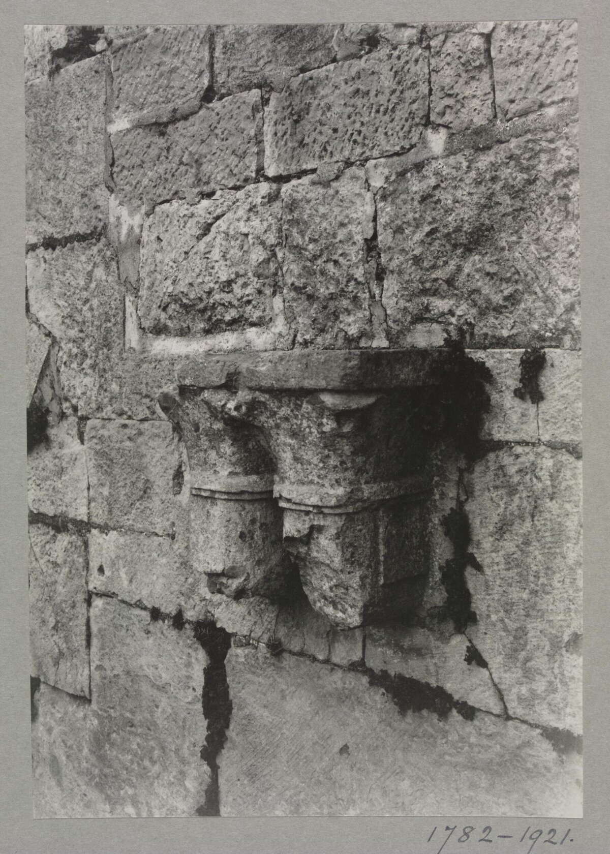 Ancient Stone Corbel on Masonry Wall