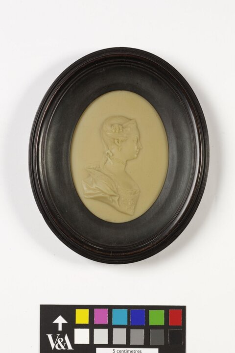 Oval Framed Female Profile Relief Portrait