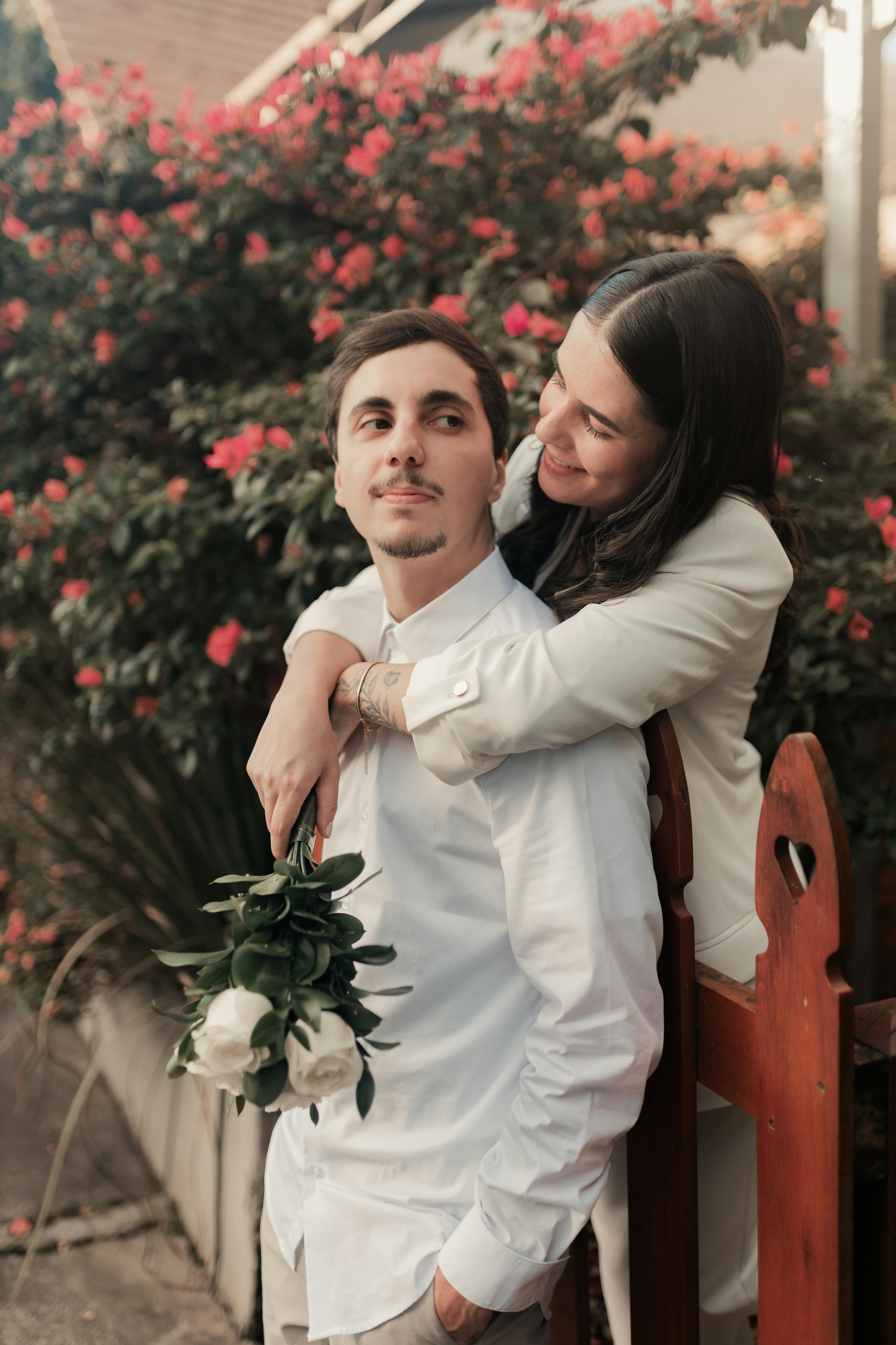 Engaged Couple Embracing Outdoors