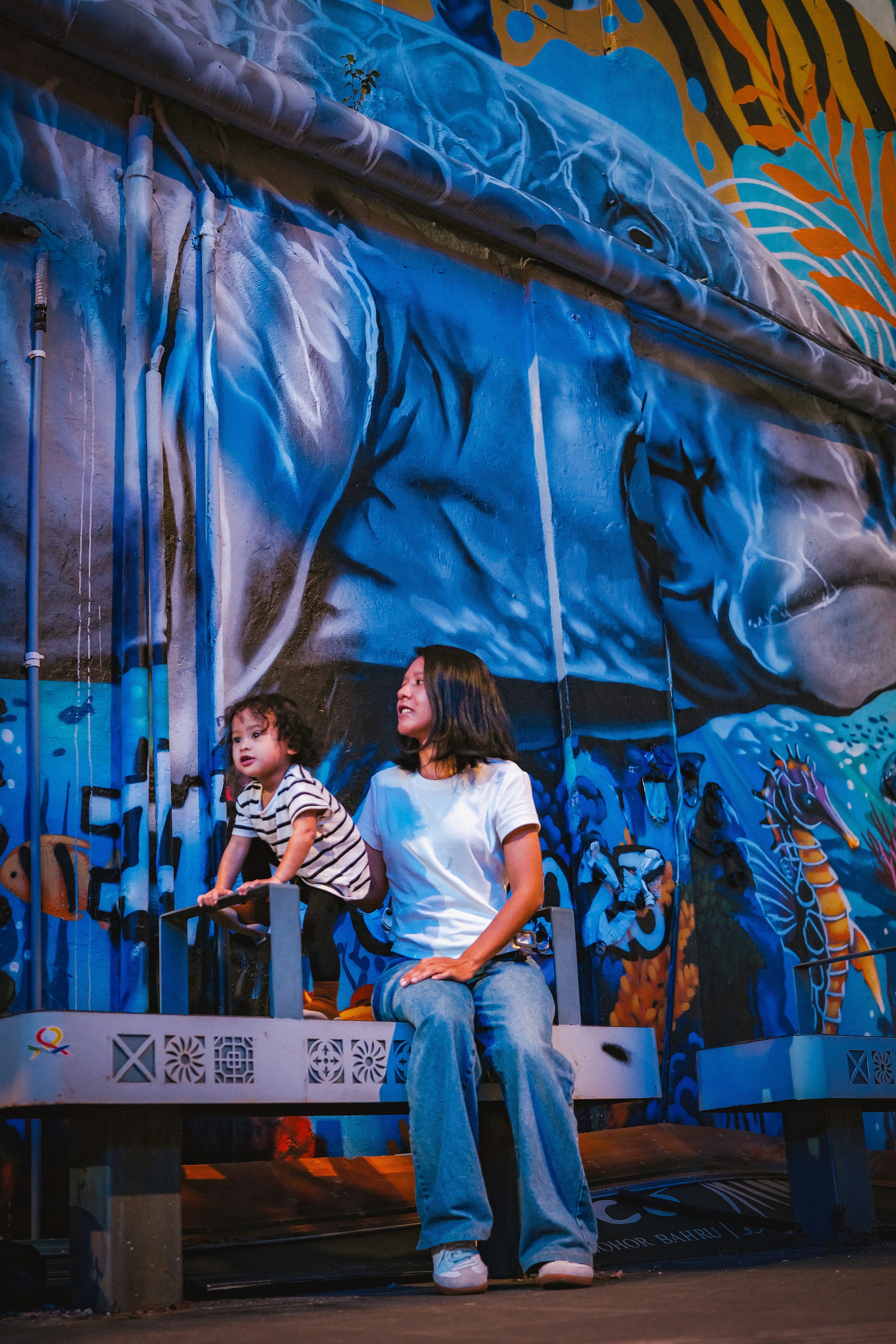 Mother and Child by Underwater Mural