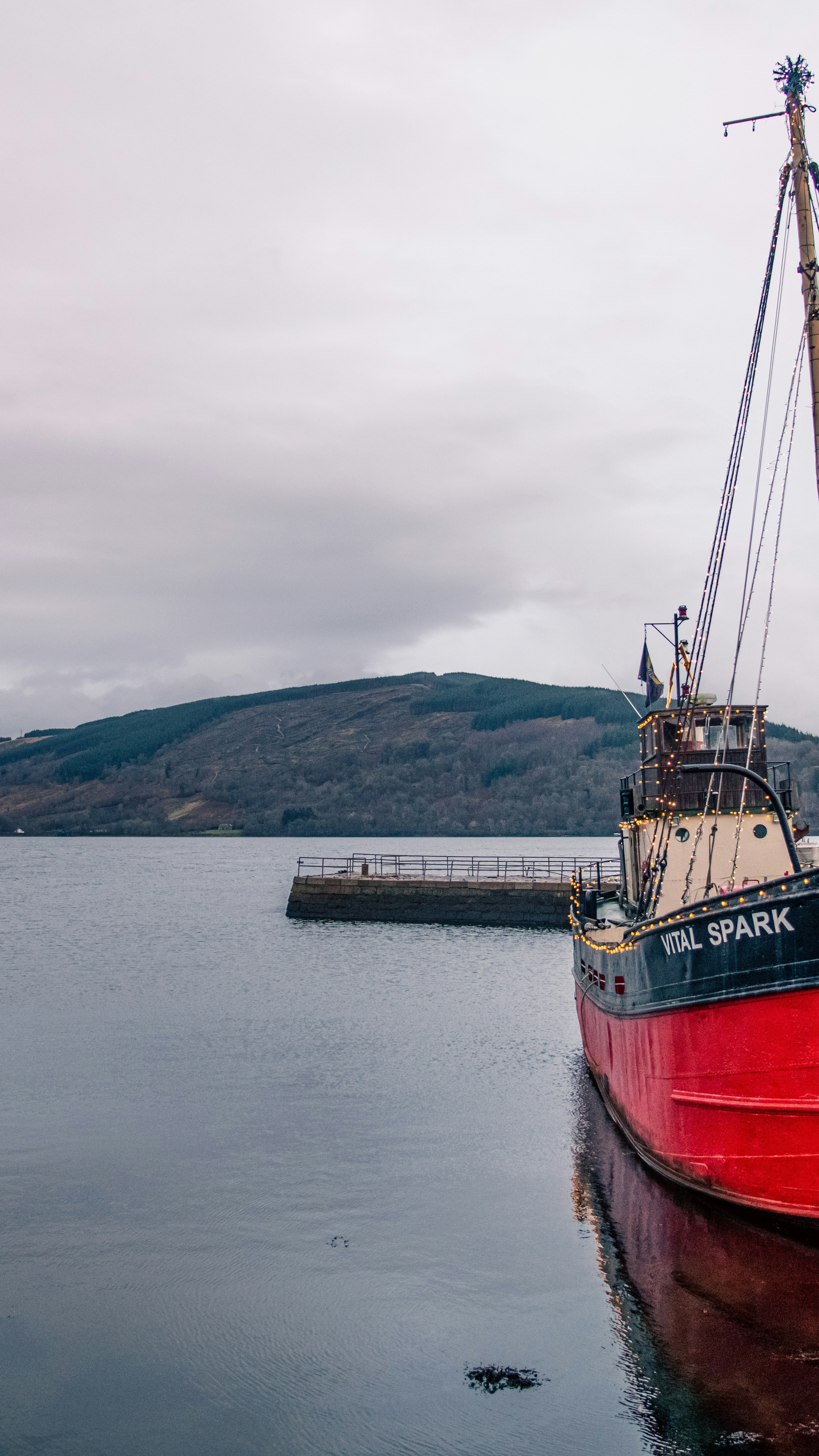 Vital Spark Boat on Calm Loch