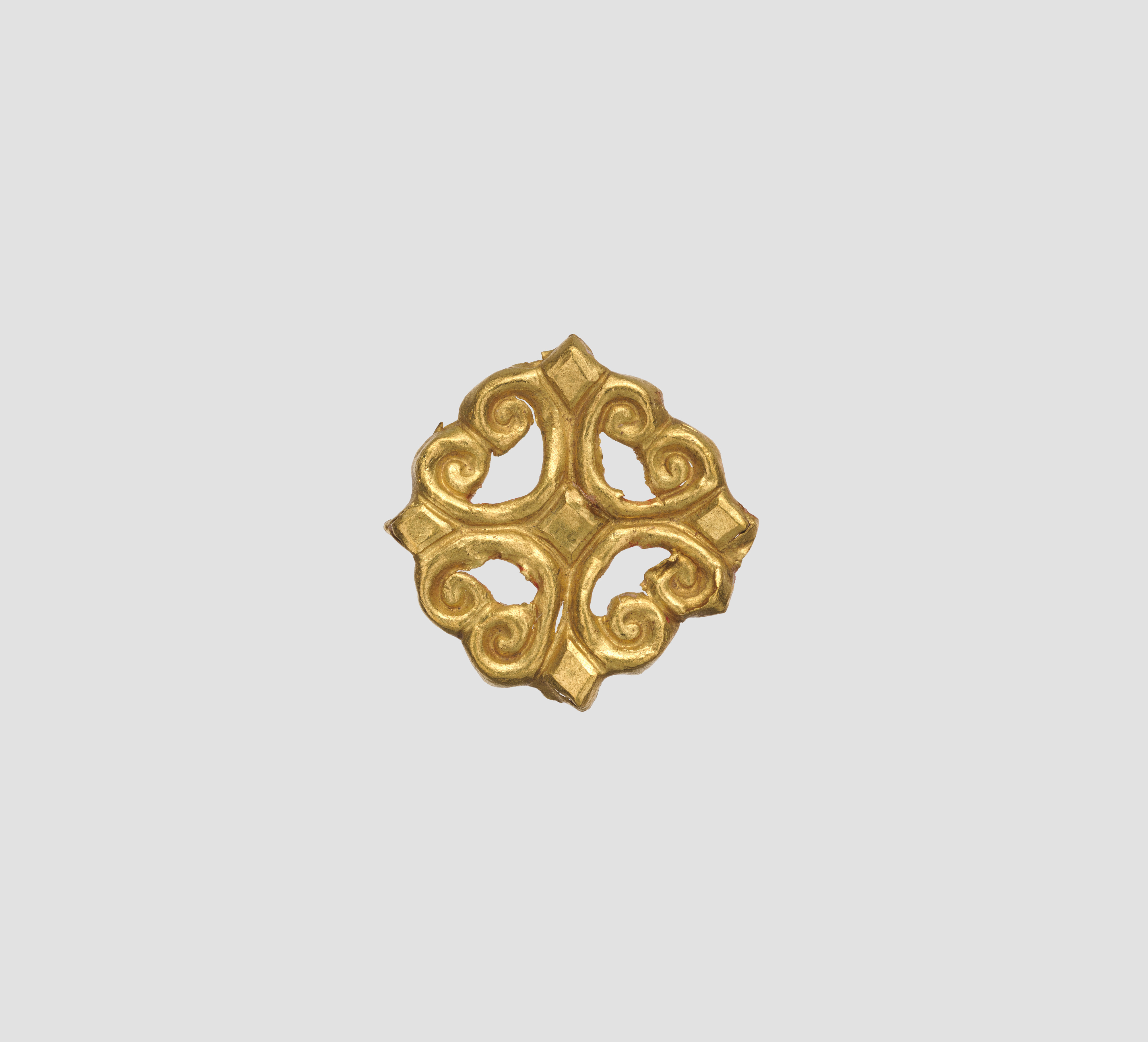 Ancient carved gold ornament