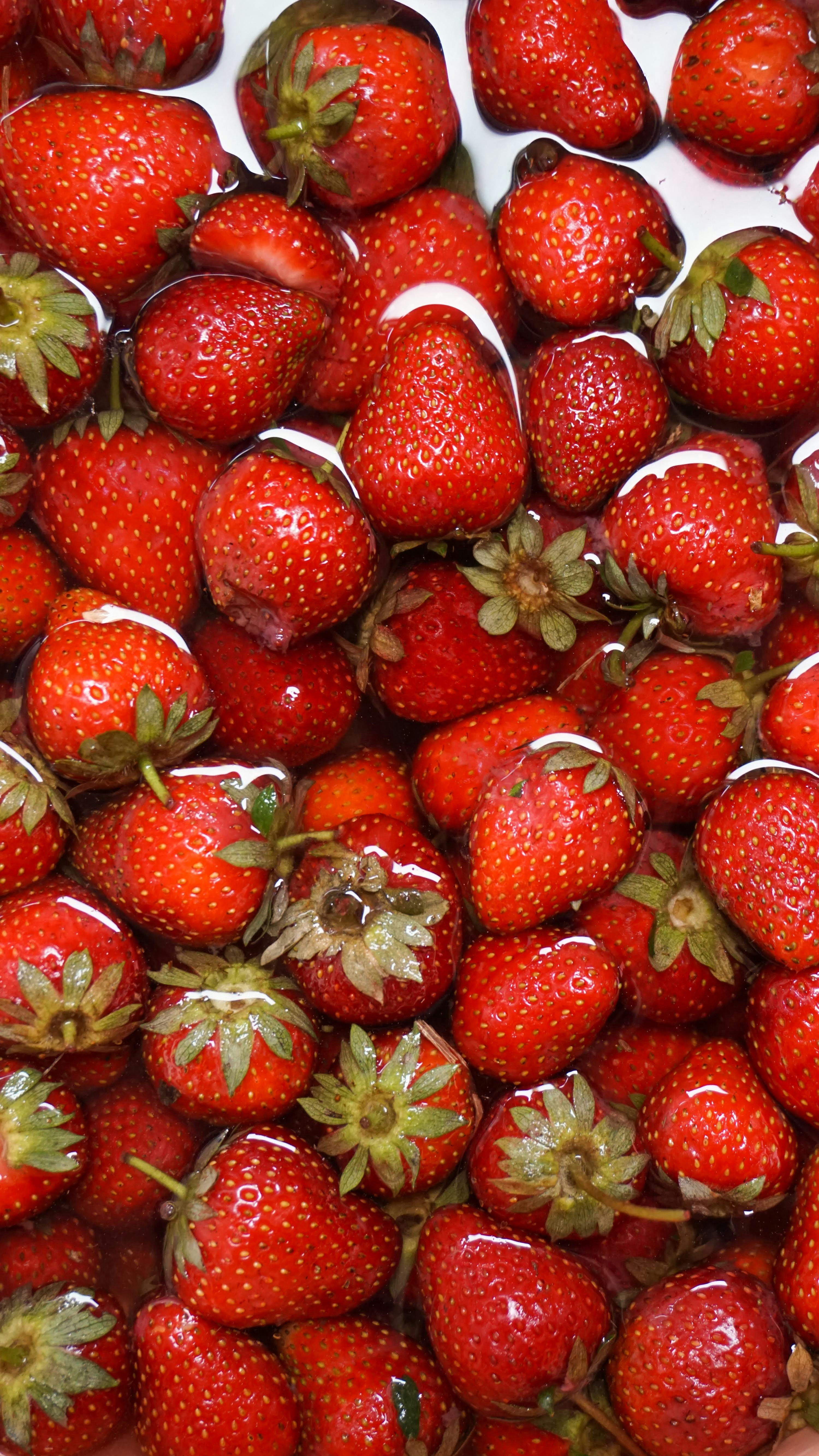 Fresh Strawberries Soaking in Water