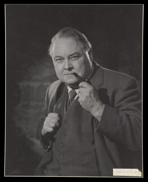 Vintage Portrait of Man Holding Pipe