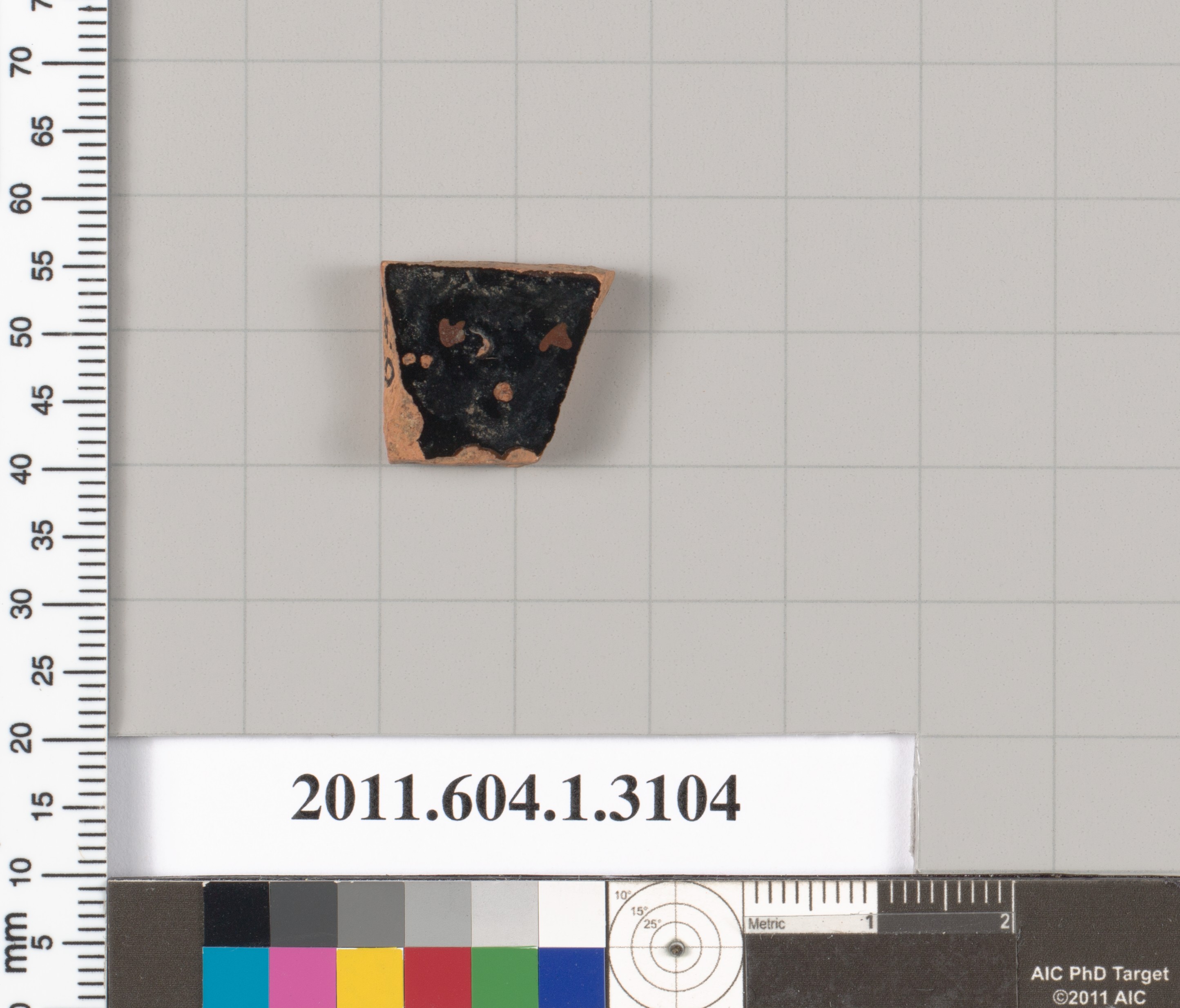 Black glazed ceramic shard