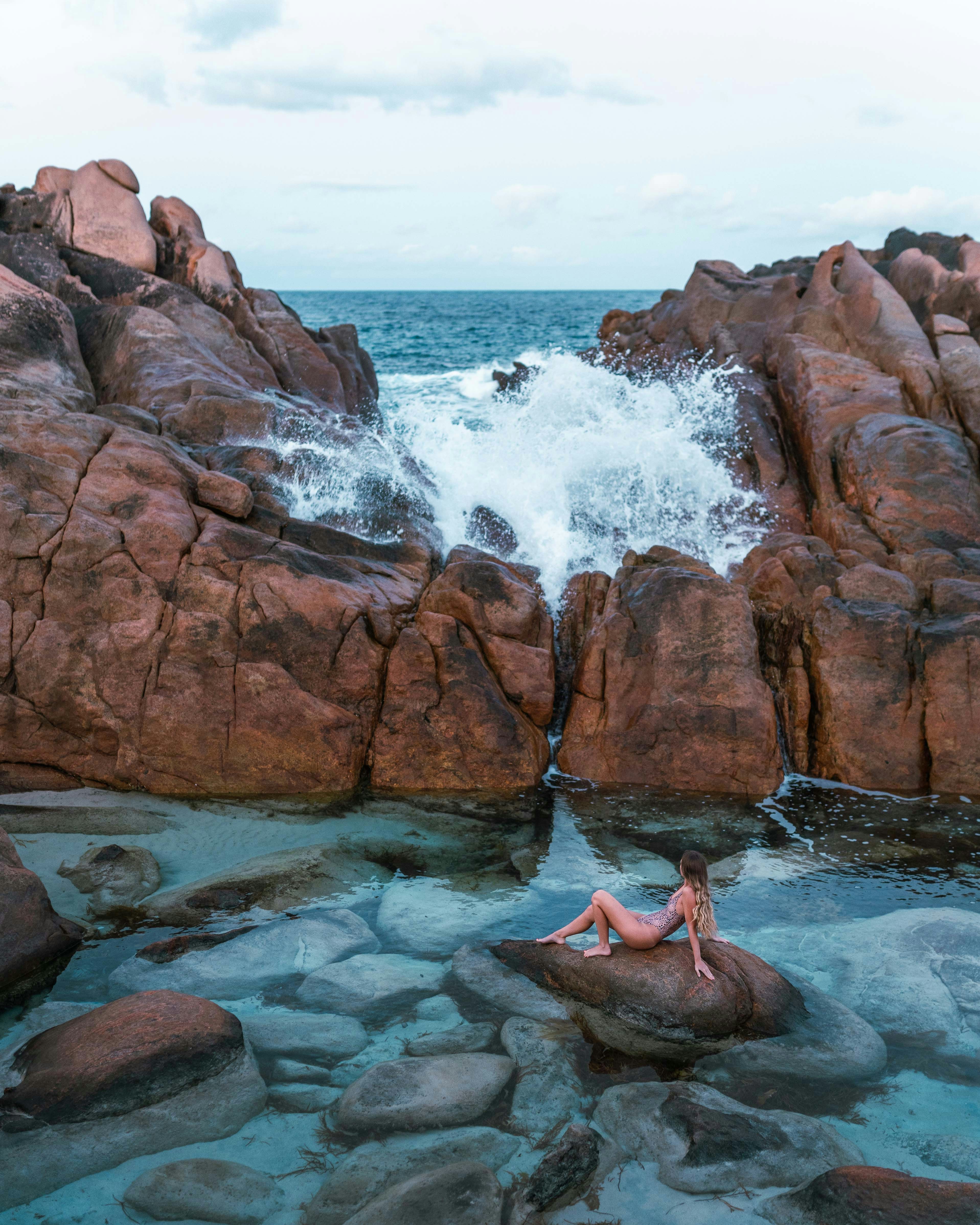 Woman by Coastal Rock Pool