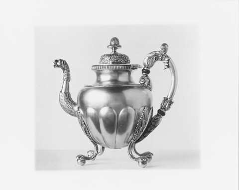 Ornate Three-Legged Silver Teapot