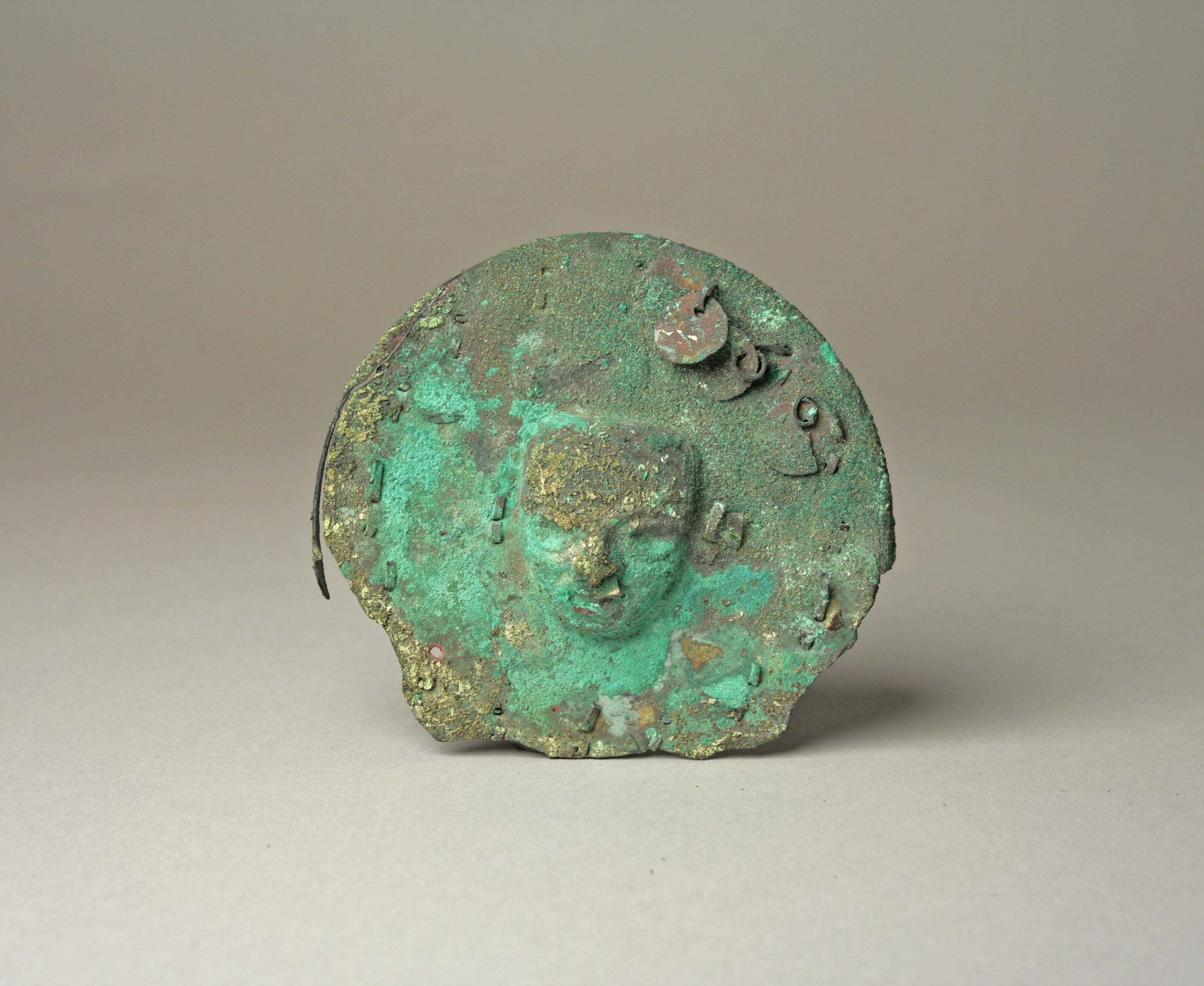 Ancient Bronze Face Relief Fragment