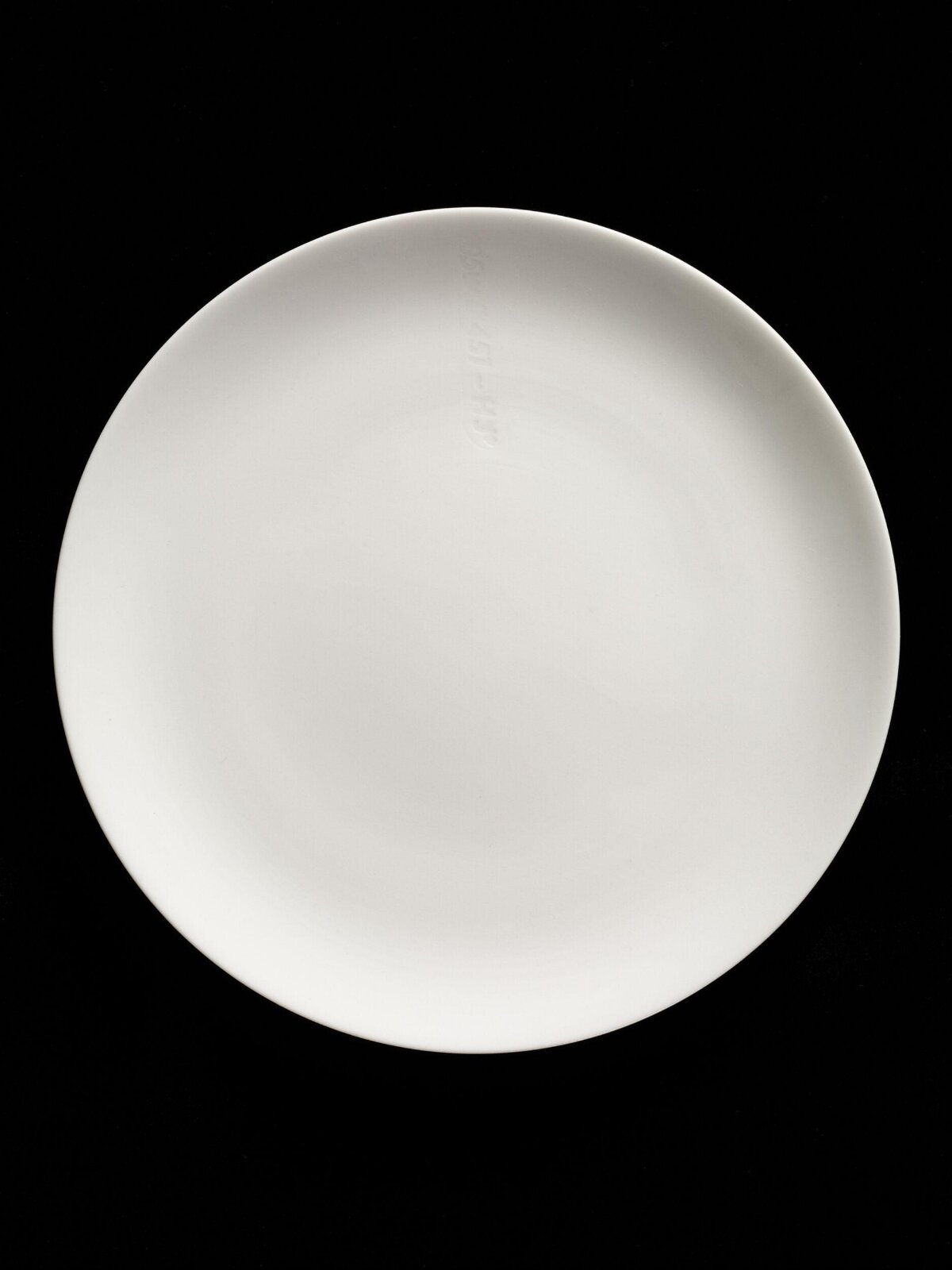 Plain White Plate On Black Background
