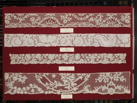 Four Antique Lace Specimens on Display
