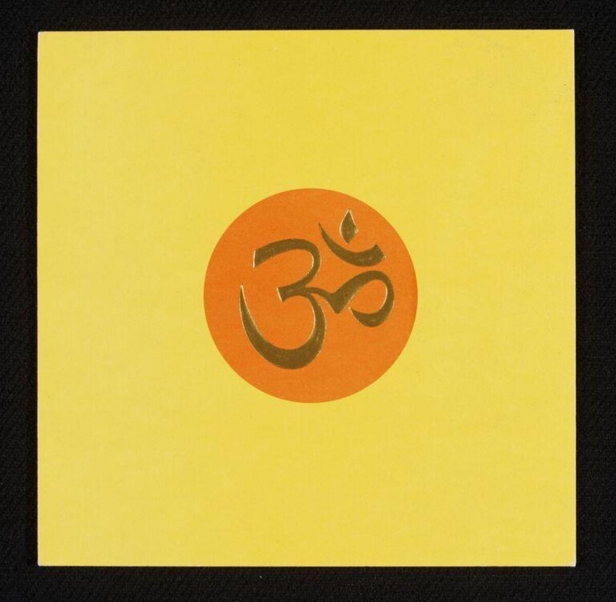 Golden Om Symbol on Yellow Card