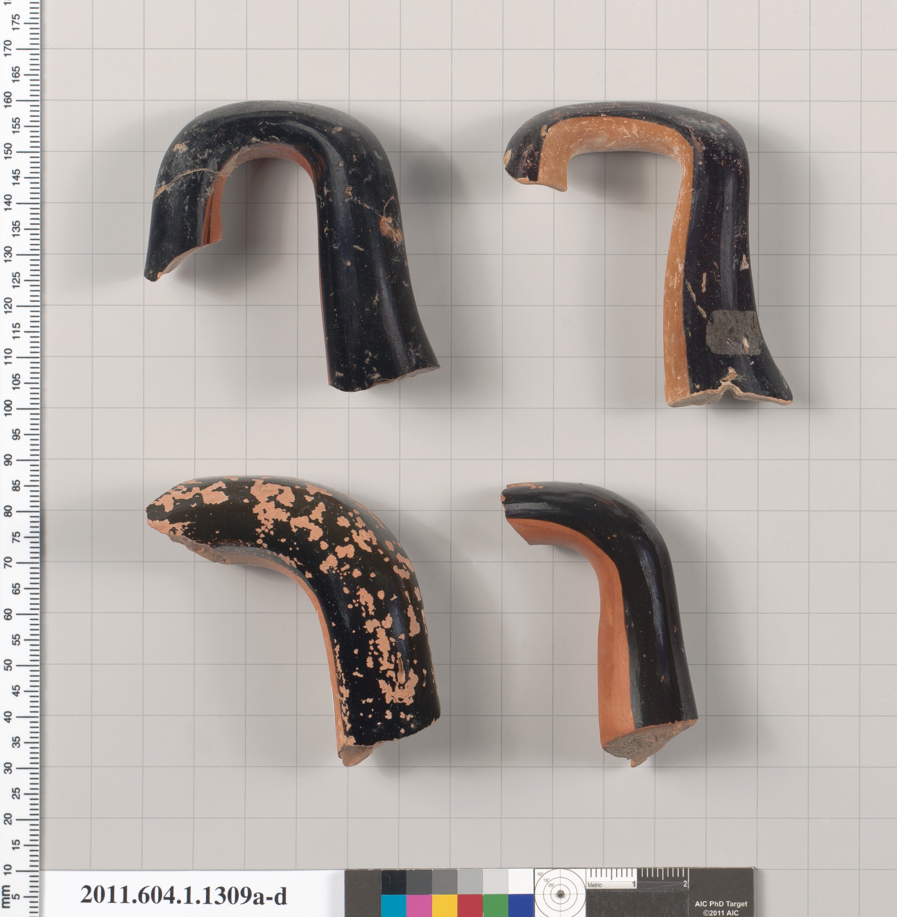 Four Ancient Pottery Handle Fragments