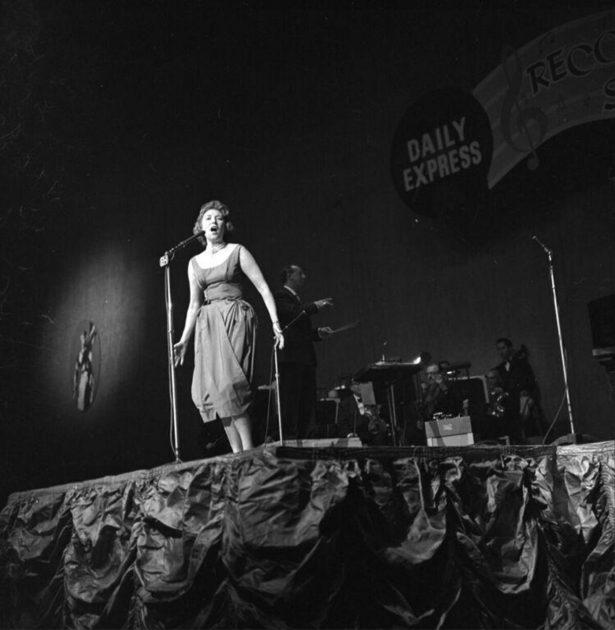 Female Singer Performing on Stage