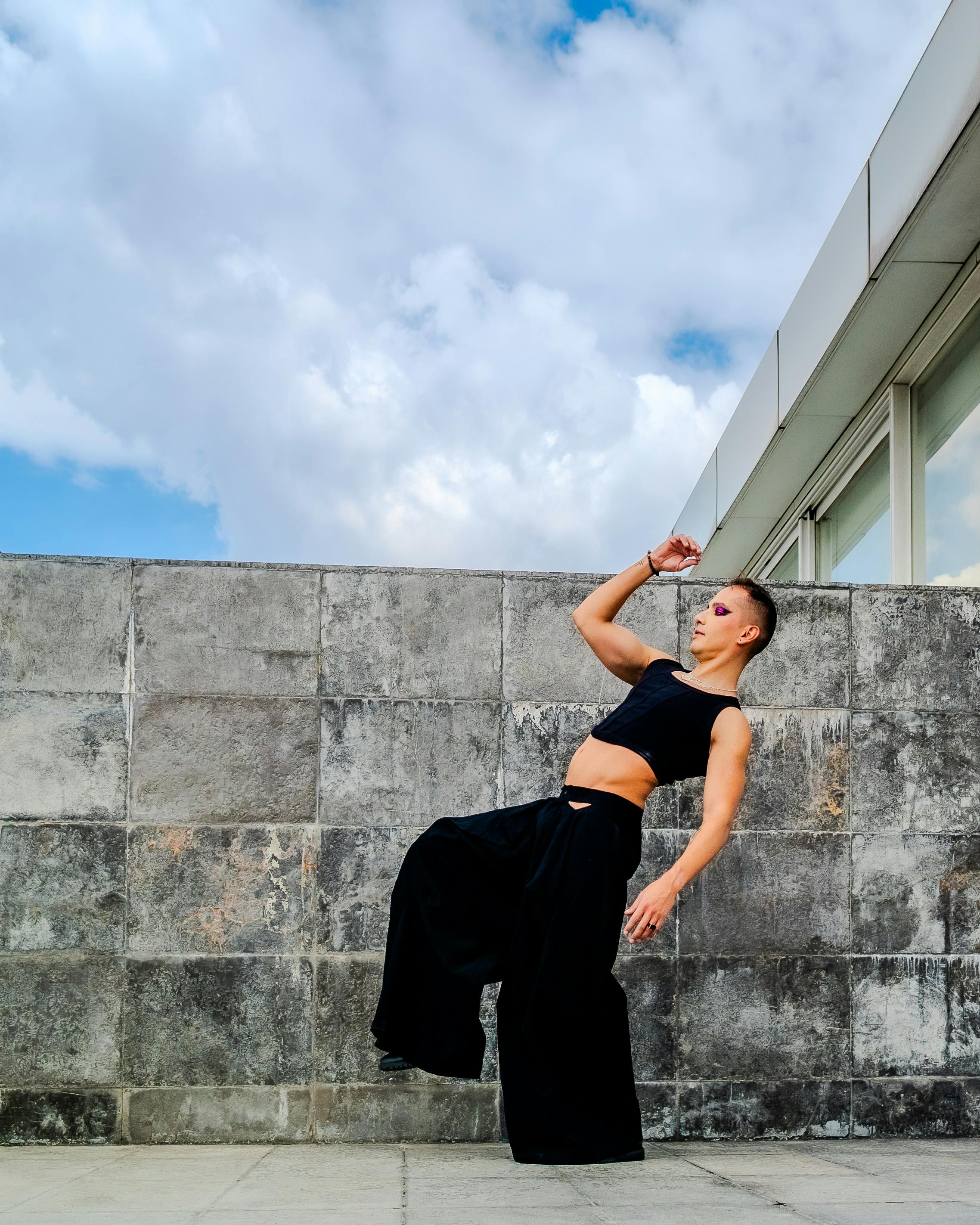 Dancer Posing On Outdoor Rooftop