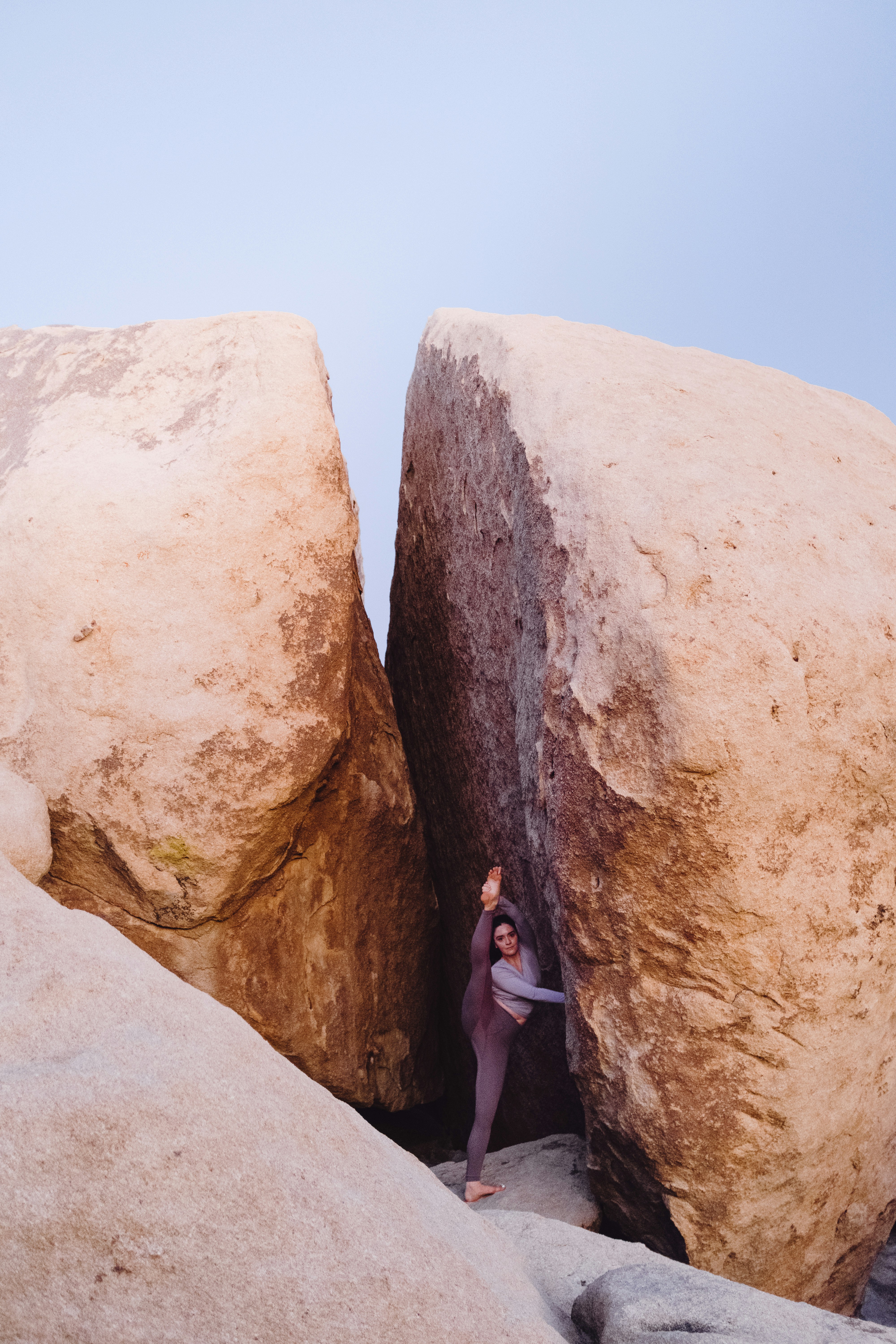 Yoga Split Between Large Boulders