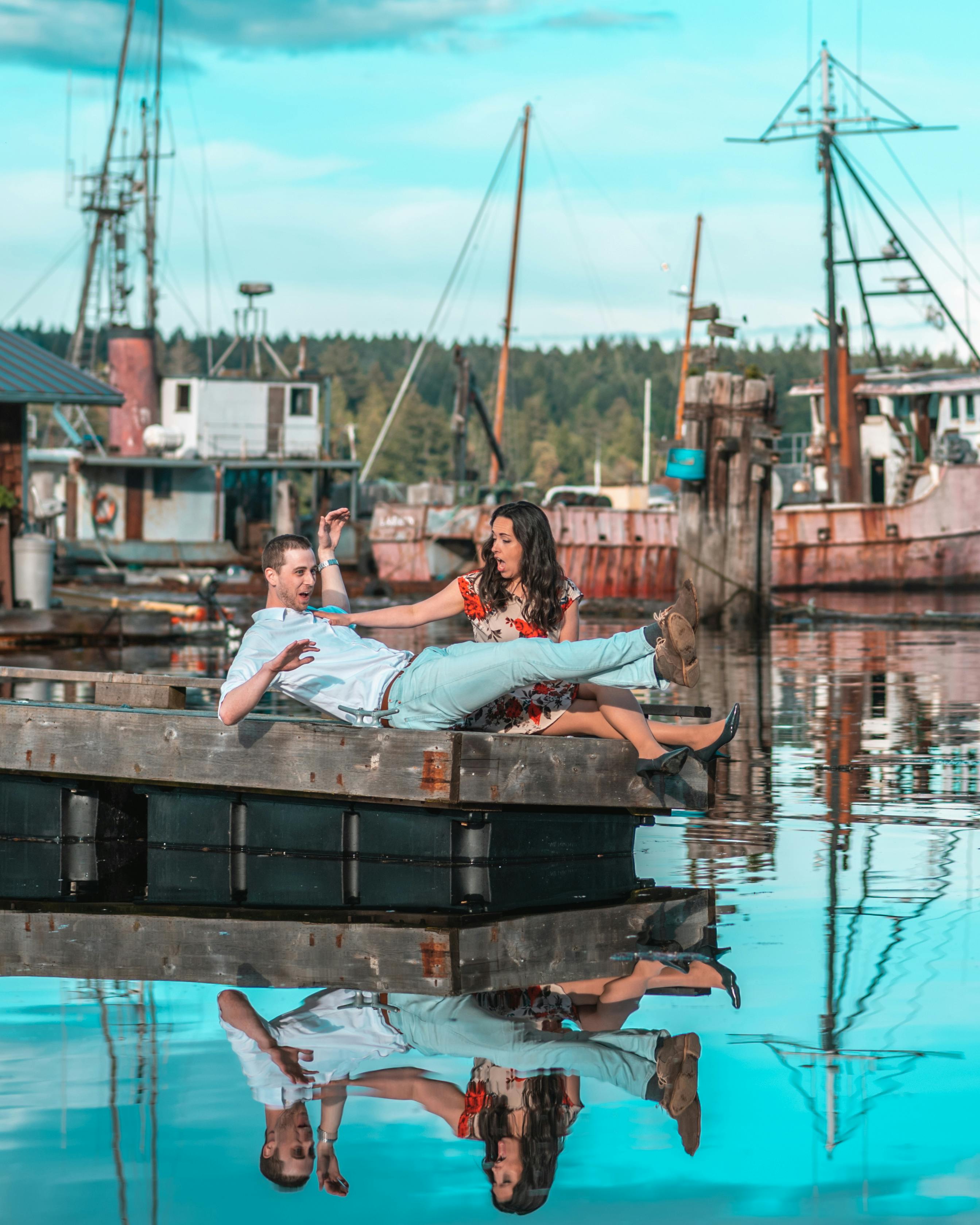 Playful Couple on Harbor Dock