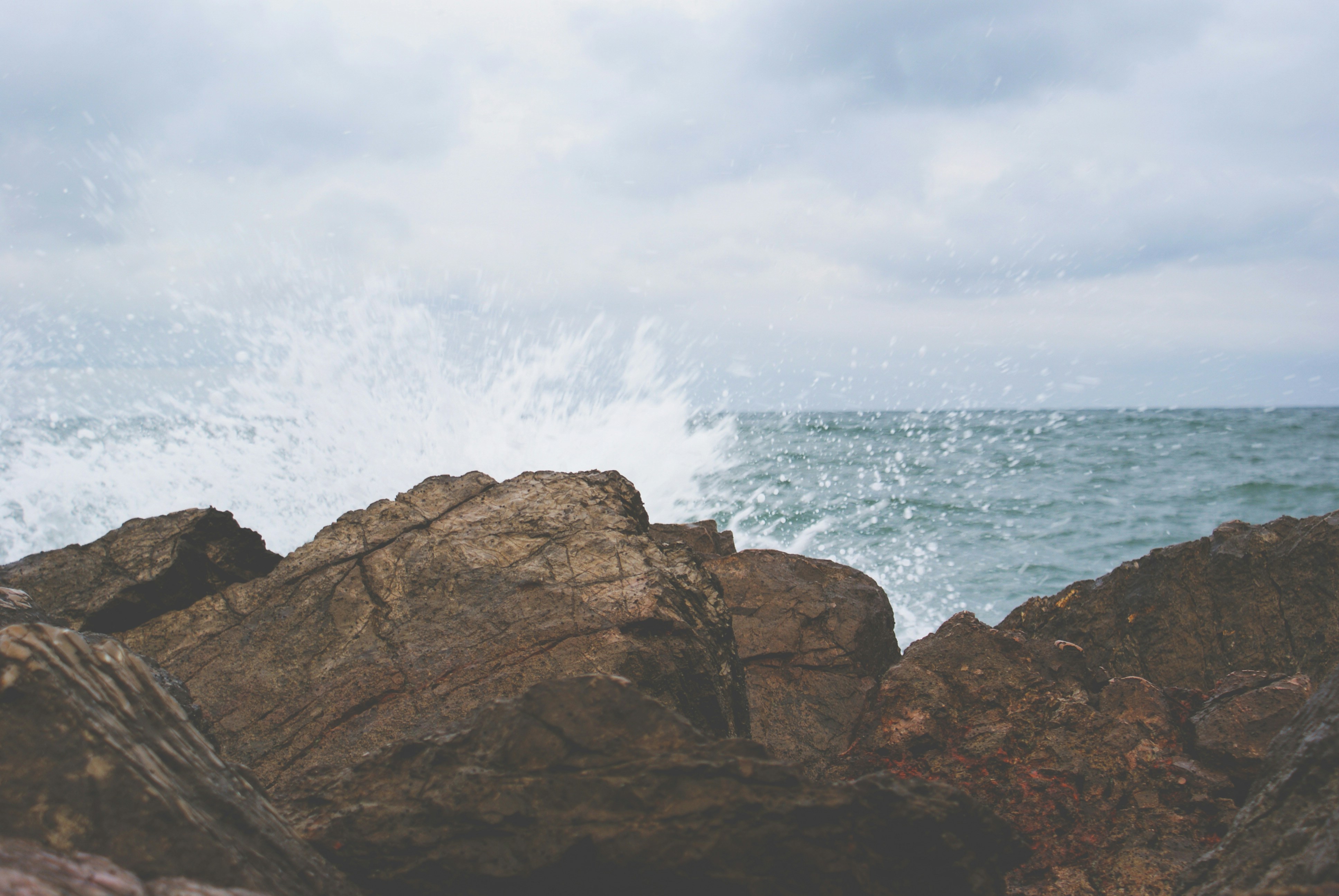 Waves Crashing on Coastal Rocks