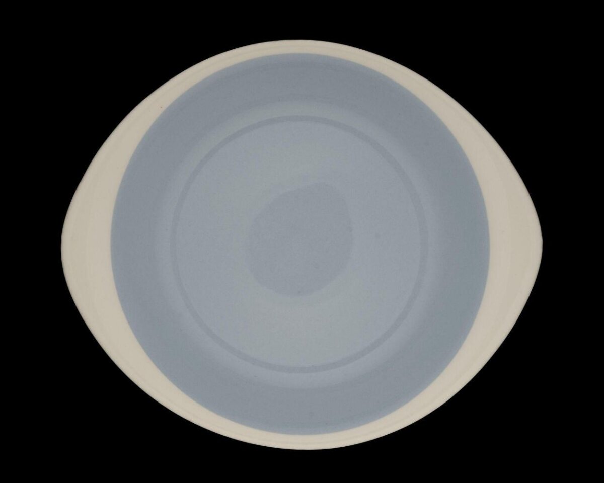 Light Blue Ceramic Plate on Black Background