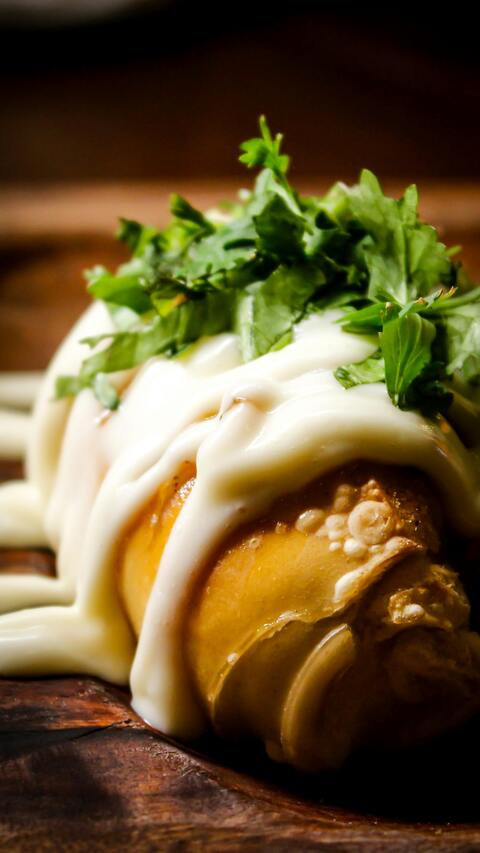Baked Stuffed Roll with Cream Sauce