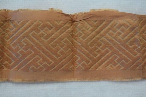 Brown Geometric Patterned Fabric Fragment