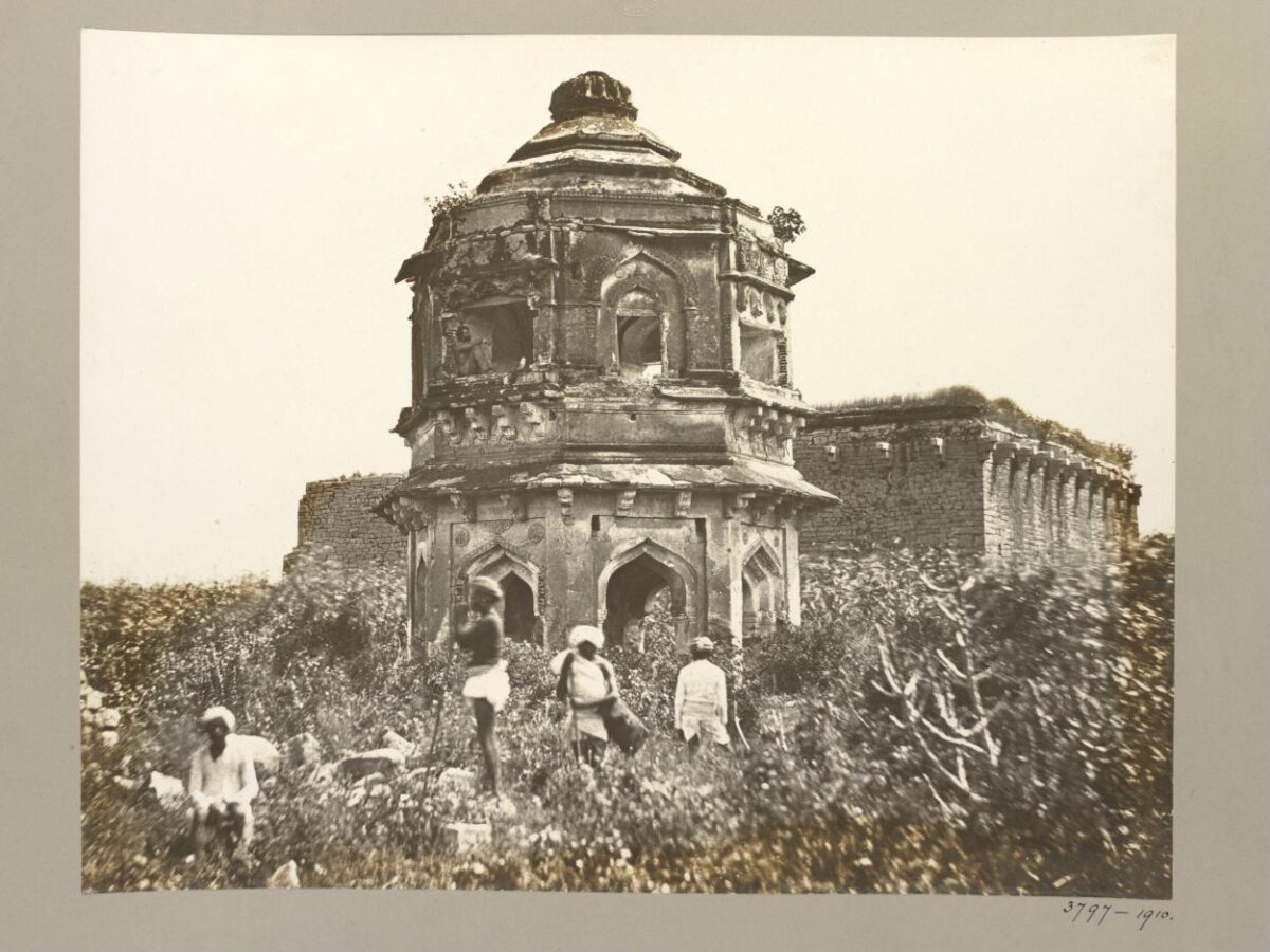 Ruined Octagonal Monument with Local Men