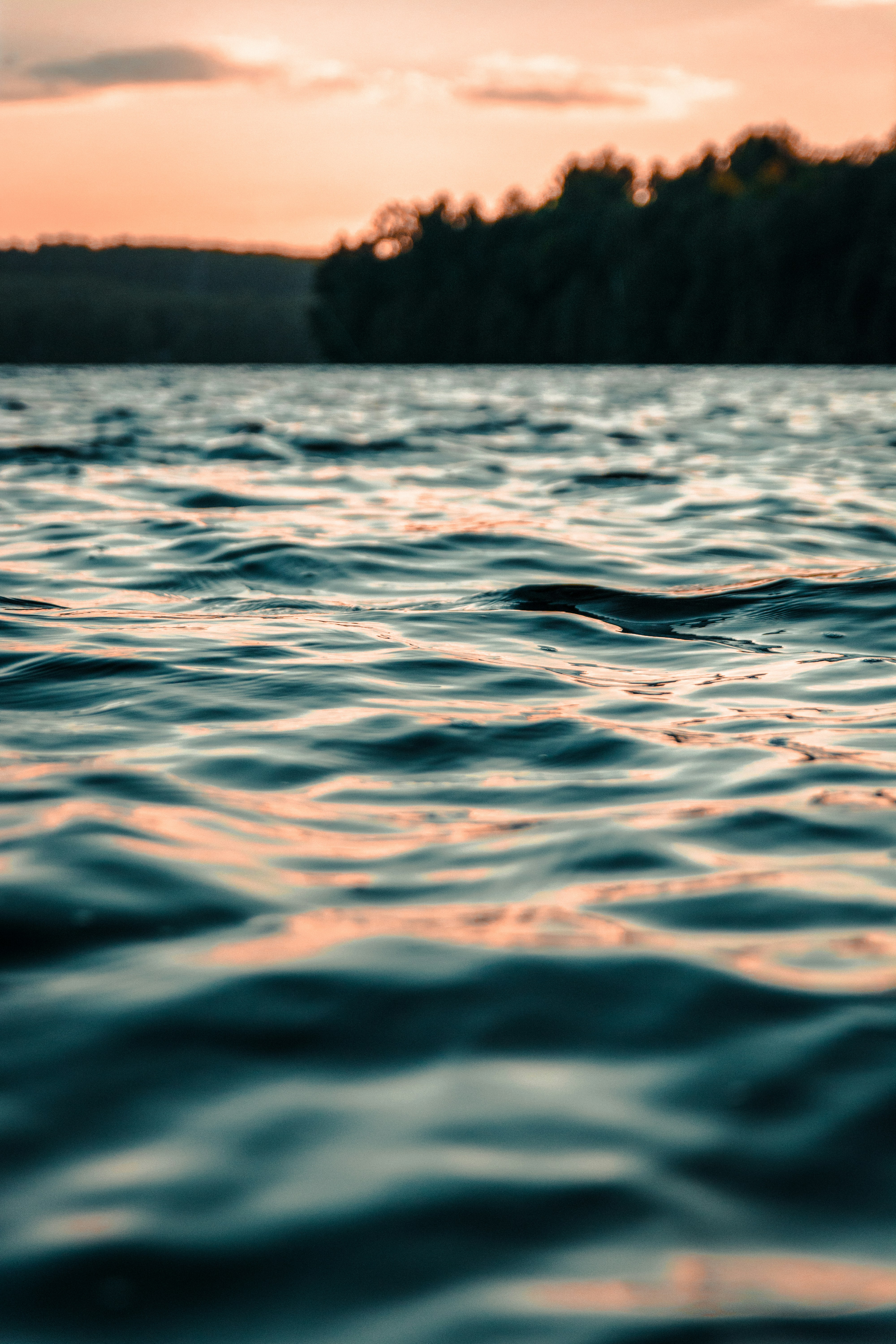 Sunset Over Calm Lake Water