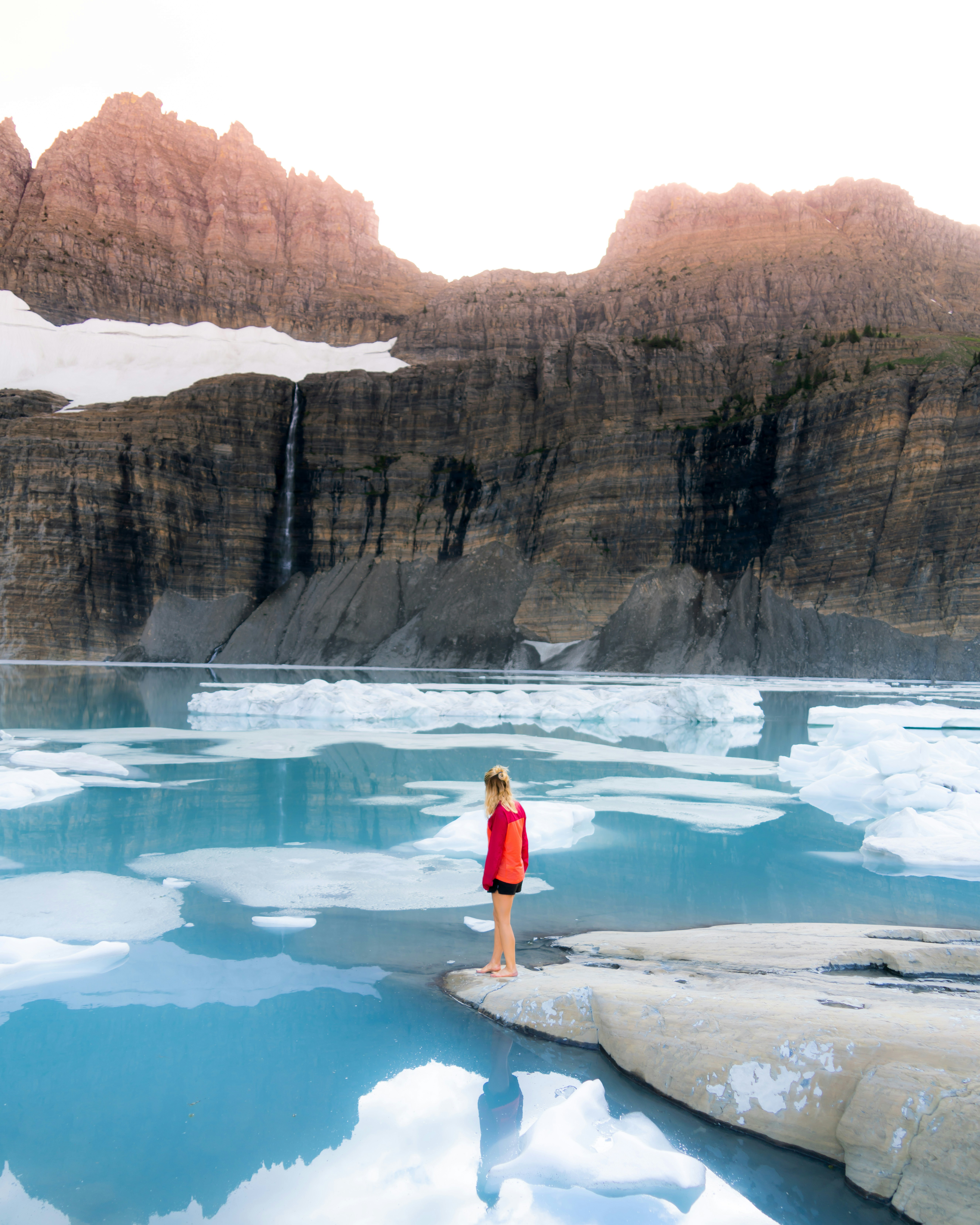 Woman by Glacial Mountain Lake